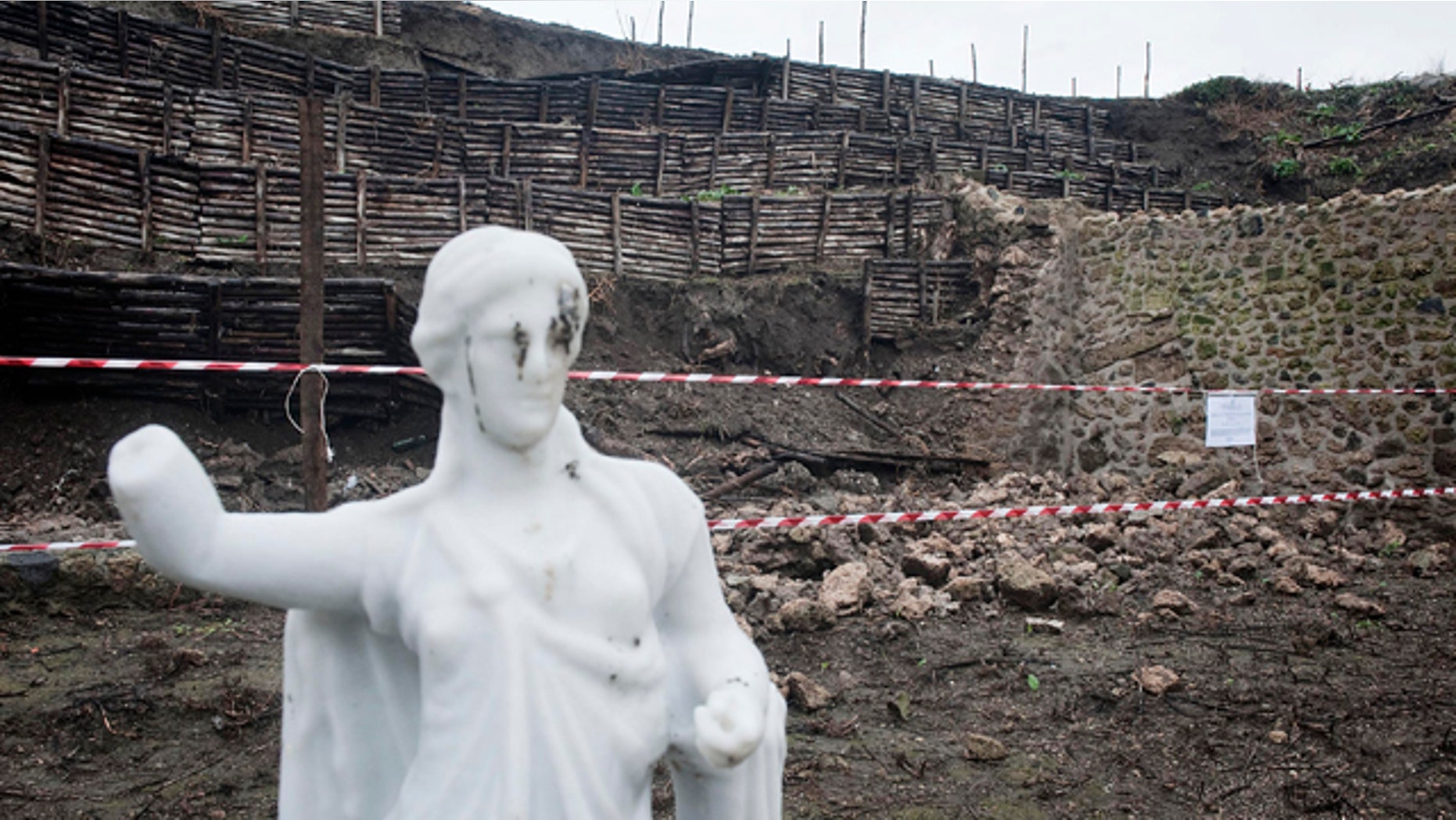 Nov. 30, 2010: A stretch of garden wall ringing an ancient house in Pompeii that gave way after days of torrential rain is cordoned-off. Officials said an inspection found that a 40-foot-long section of wall forming part of the perimeter of a garden area near the House of the Moralist gave way in several points.