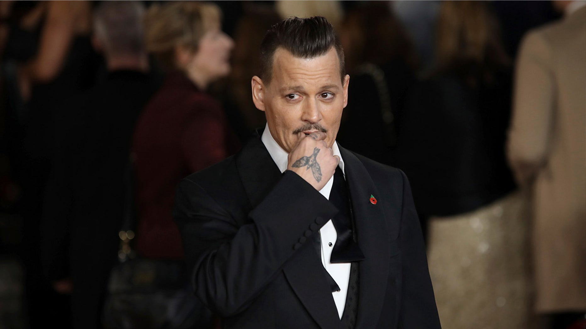 The 54-year-old actor looked worse for wear at the London premiere of "Murder on the Orient Express."