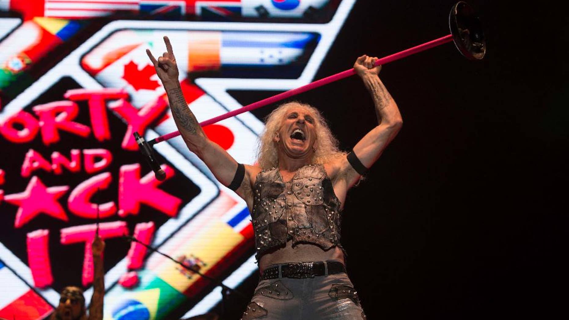 In this July 23, 2016, file photo, Dee Snider of Twisted Sister performs during the Hell and Heaven music festival in Mexico City.