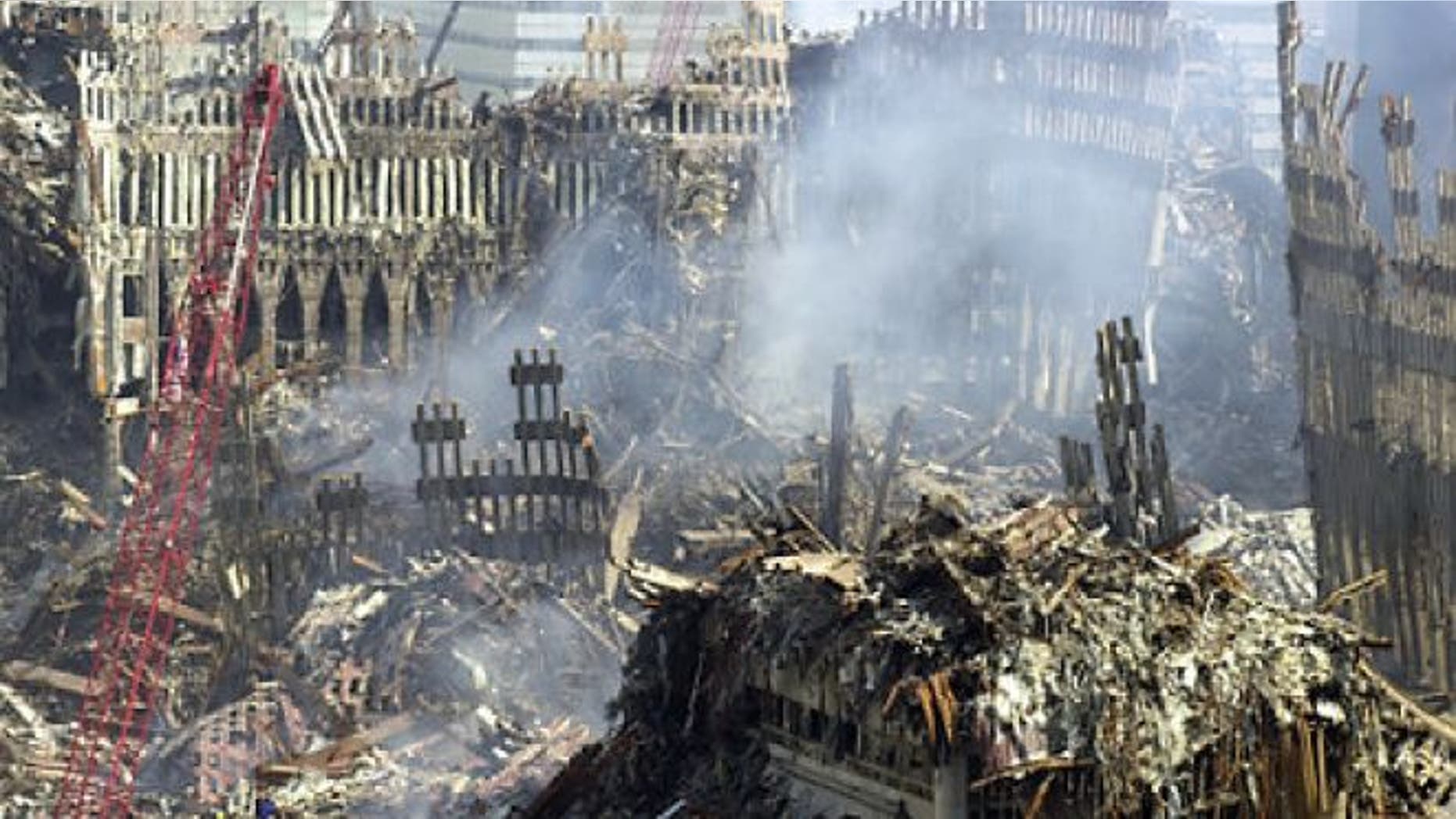 Sept. 19, 2001: Smoke rises from ground zero of the collapsed World Trade Center, more than a week after the terrorist attacks in New York.