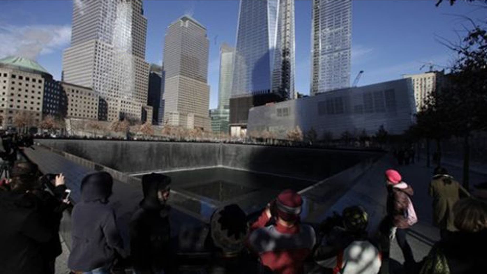 Dec. 29, 2011: Visitors walk around the National September 11 Memorial.