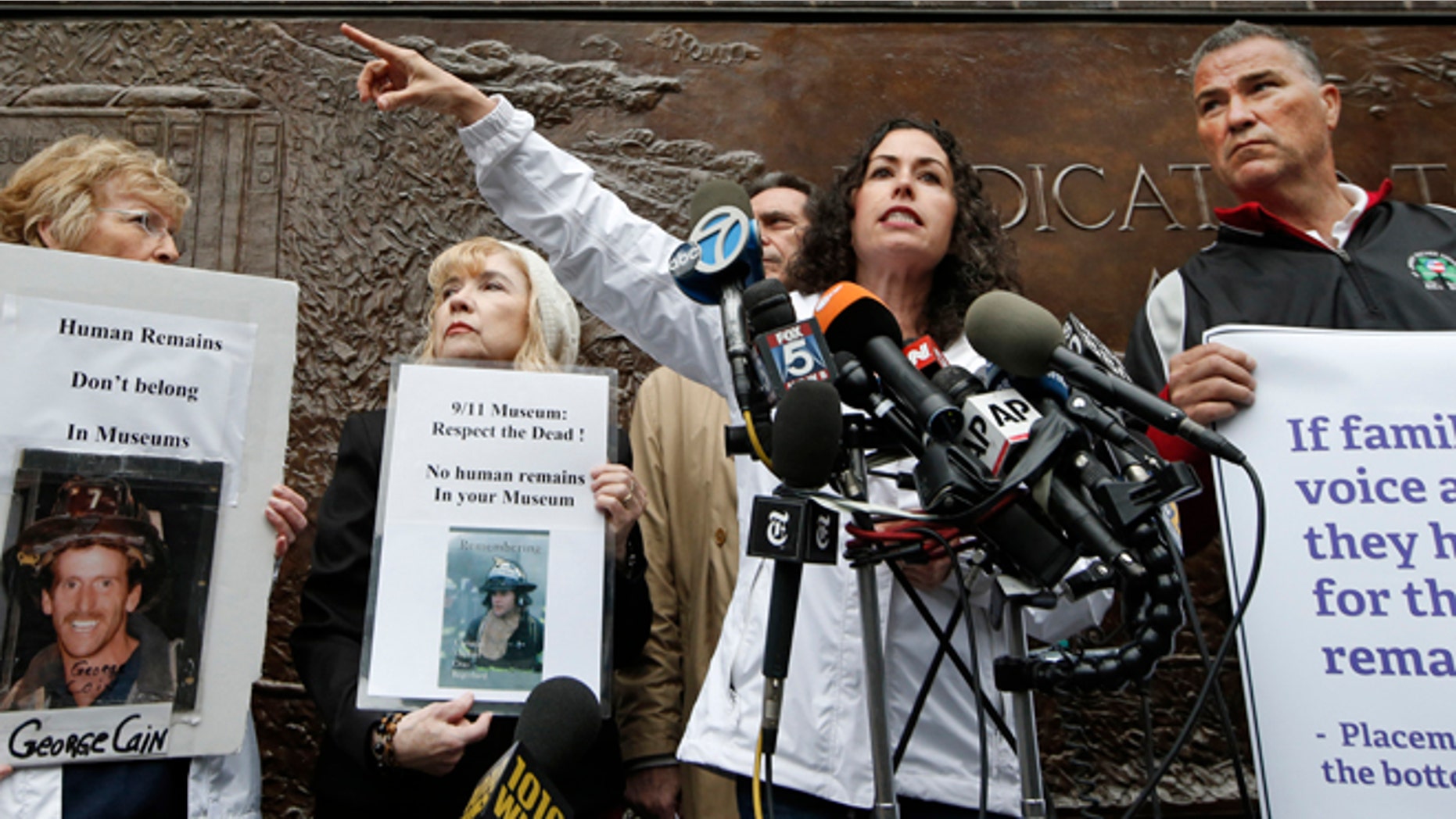 May 8, 2014: Rosaleen Tallon, sister of firefighter Sean Tallon, killed in the 9-11 World Trade Center attacks and other 9-11 victims' family members hold a press conference in front of a fire station opposite the National September 11 Memorial & Museum in New York.