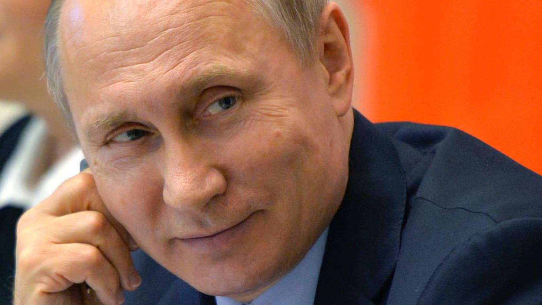 Russian President Vladimir Putin attends a meeting with members of the Legislative Council in St. Petersburg, Russia, on April 29, 2016. (The Associated Press)