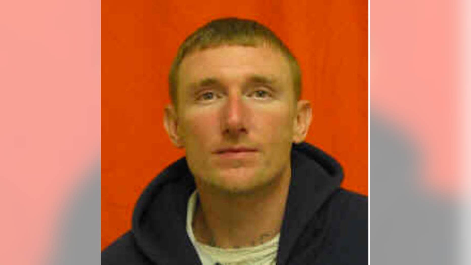 This photo provided by Ohio Department of Rehabilitation and Correction shows Jesse D. Hanes. Dona Ana County Sheriff's spokeswoman Kelly Jameson says that Hanes is suspected of gunning down Hatch Police Officer Jose Chavez, 33, during a traffic stop Friday, Aug. 12, 2016.
(Ohio Department of Rehabilitation and Correction via AP)