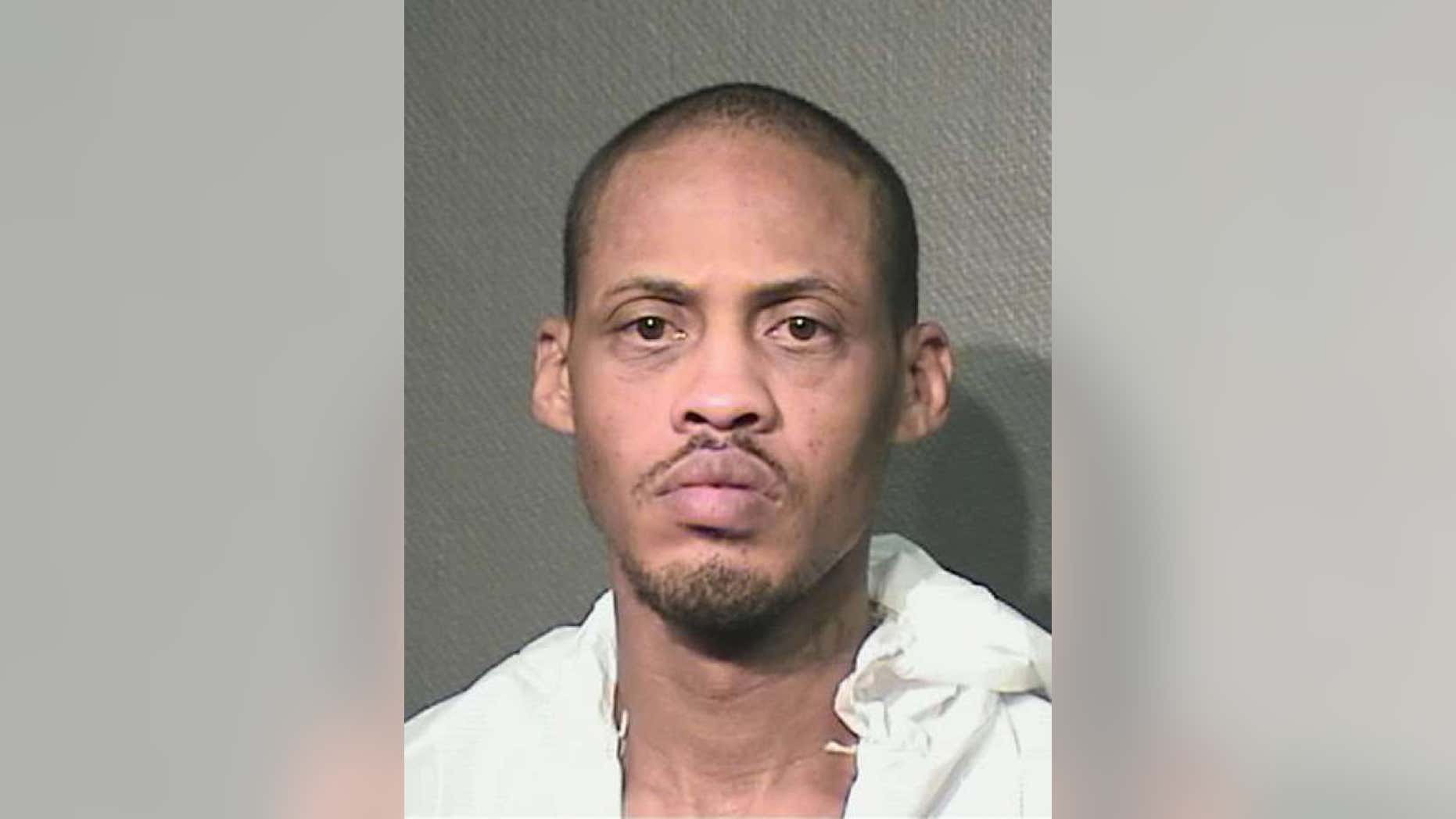Kenneth Wayne Lockings Jr., 46, is accused of 'nearly' decapitating girlfriend with samurai sword.