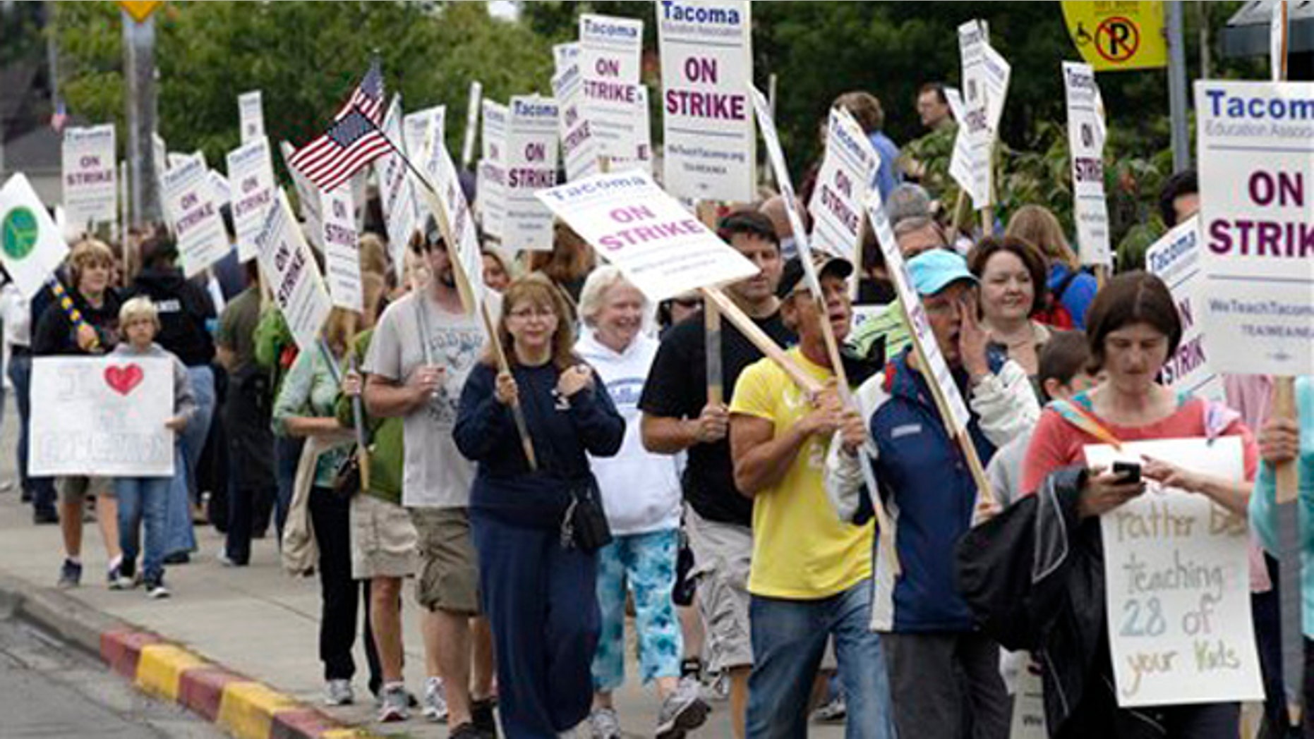 Wednesday, Sept. 14, 2011: Striking teachers picket outside Jason Lee Middle School in Tacoma, Wash.