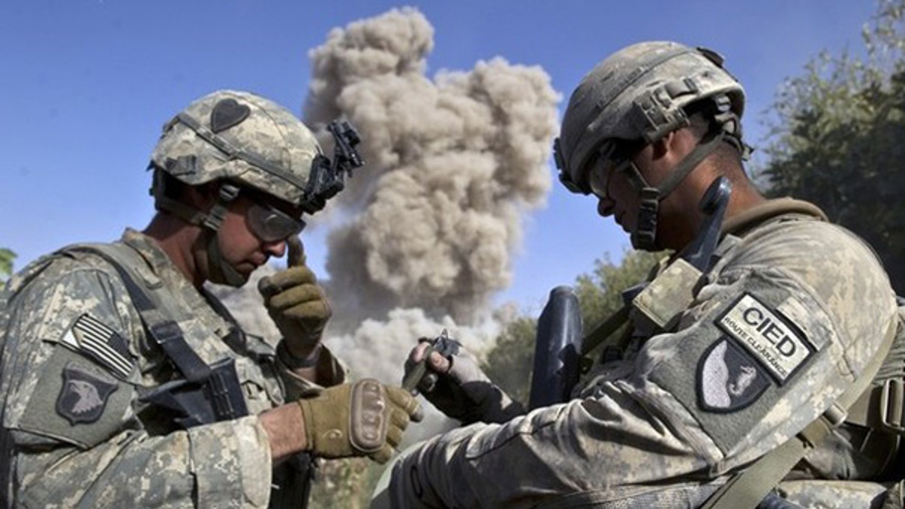 Oct. 25: U.S. soldiers blow up a building they believe the Taliban may use in Kandahar, Afghanistan.