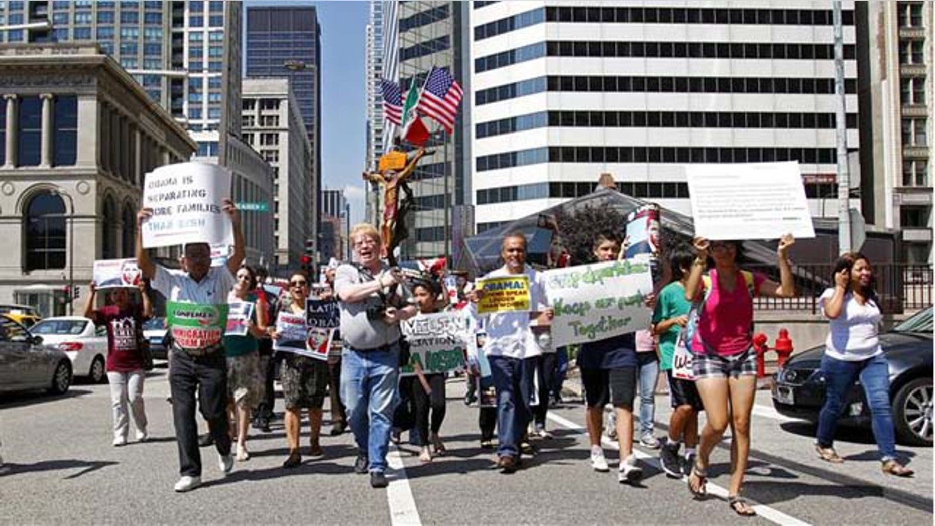 Pro-immigration reform activists protested on Tuesday in front of President Barack Obama's Chicago reelection campaign headquarters.