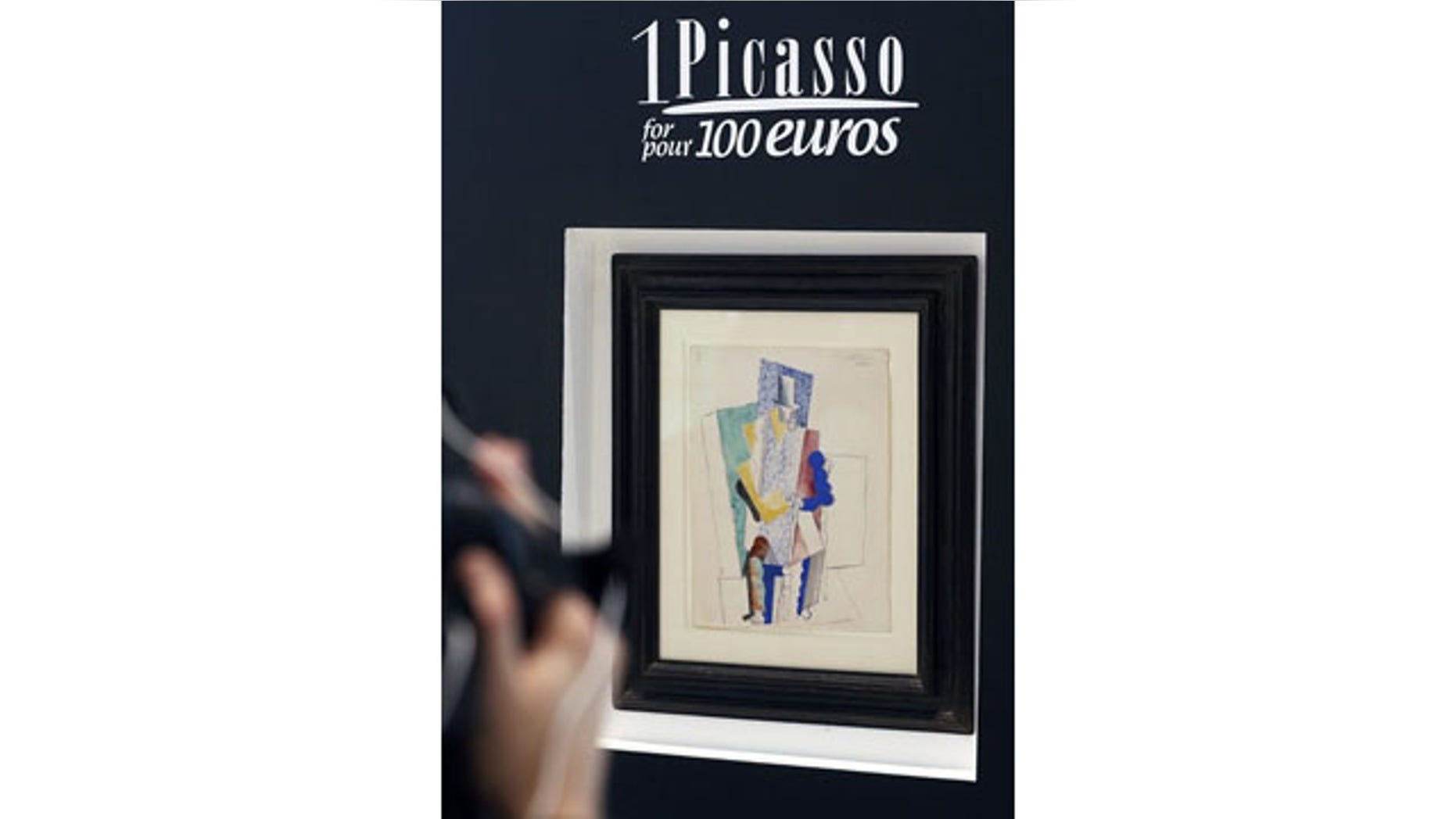 December 12, 2013: Pablo Picasso's 1914 painting "Man with Opera Hat" on display in Paris (AP Photo)
