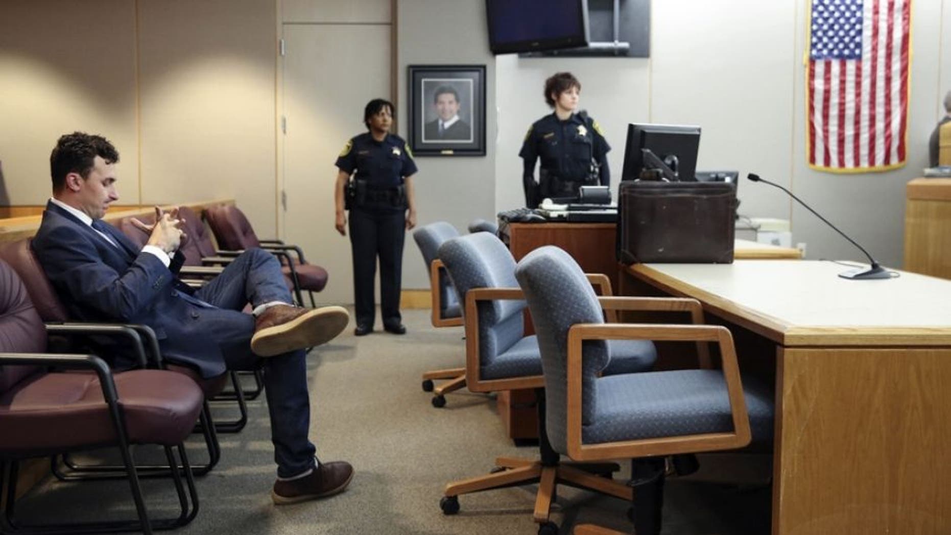 May 5, 2016; Dallas, TX, USA; Former Texas A&M and Cleveland Browns quarterback Johnny Manziel appears before Judge Roberto Cañas at the Frank Crowley Courts Building. Manziel reported to court for the first time since a Dallas County grand jury indicted him last month on a misdemeanor domestic violence charge. Former girlfriend Colleen Crowley has accused him of kidnapping, hitting and threatening to kill her in January. Mandatory Credit: Smiley N. Pool/Pool Photo via USA TODAYSports