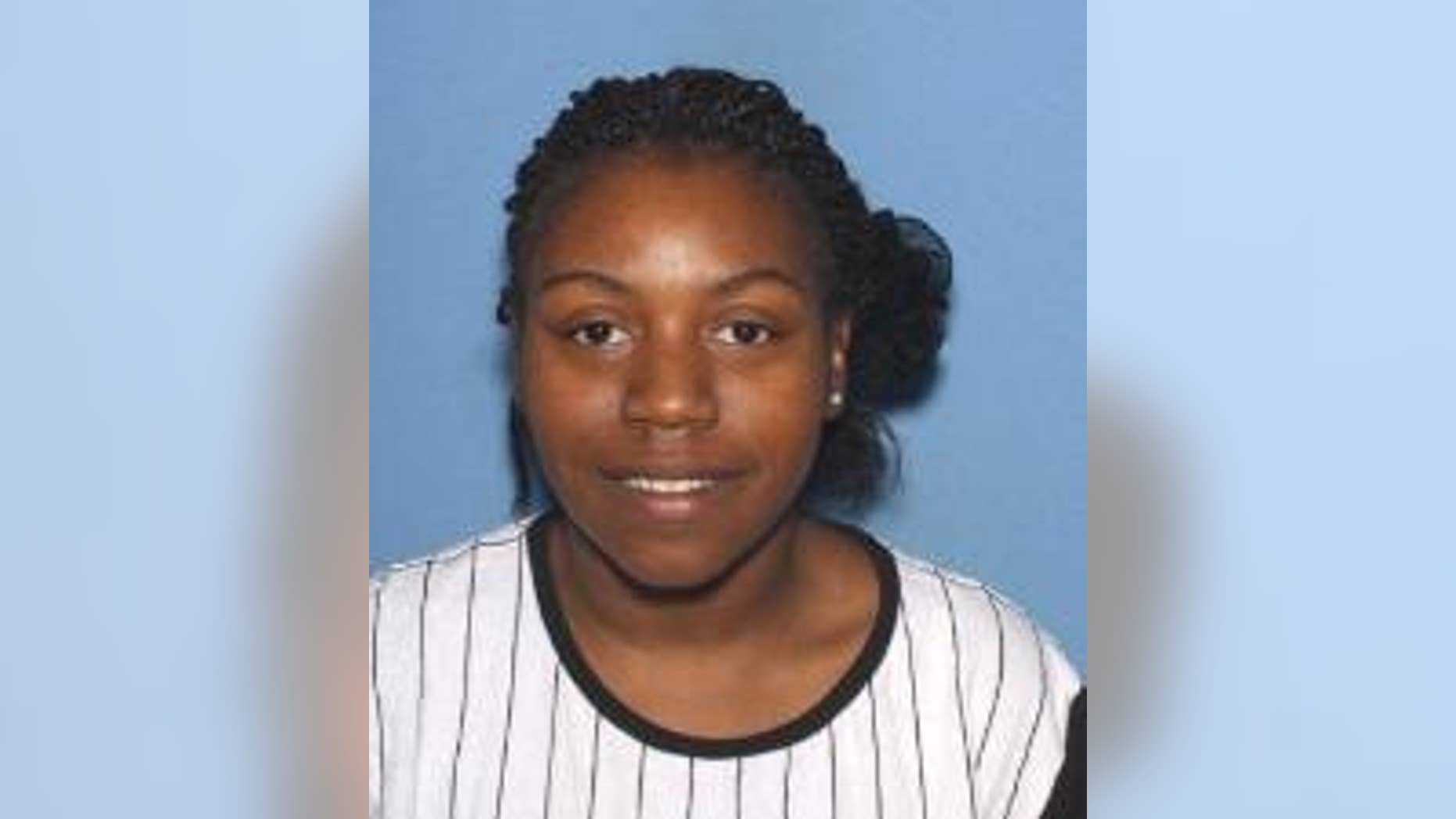 Keysheonna Reed, 24, was arrested Thursday in connection with the deaths of twins found in a suitcase in February.
