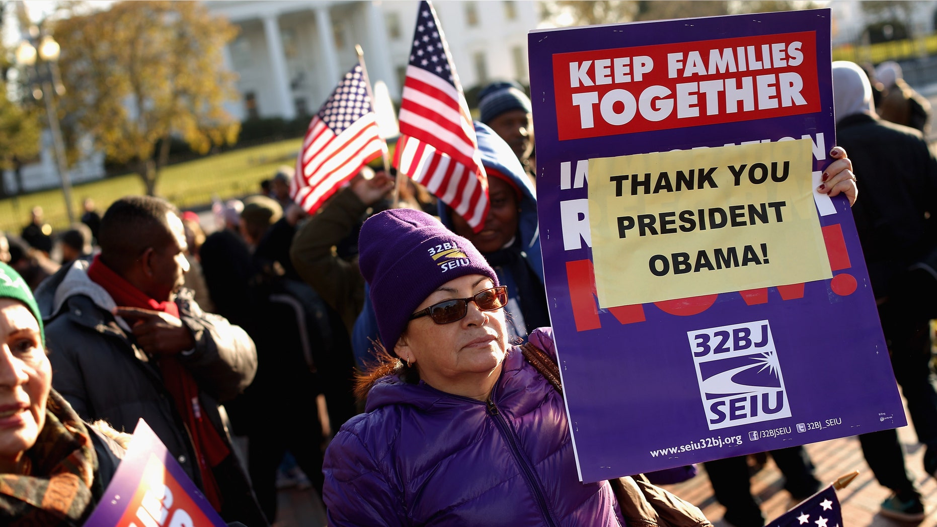 WASHINGTON, DC - NOVEMBER 21: About 100 people gather to rally in support of President Barack Obama's executive action on immigration policy in Lafayette Square across from the White House November 21, 2014 in Washington, DC. Obama announced a plan on Thursday that would ease the threat of deportation for about 4.7 million undocumented immigrants in the United States. (Photo by Chip Somodevilla/Getty Images)