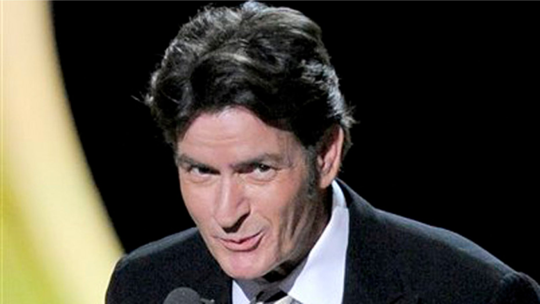 Sept. 18, 2011: Charlie Sheen presents the award for outstanding lead actor in a comedy series at the 63rd Primetime Emmy Awards.