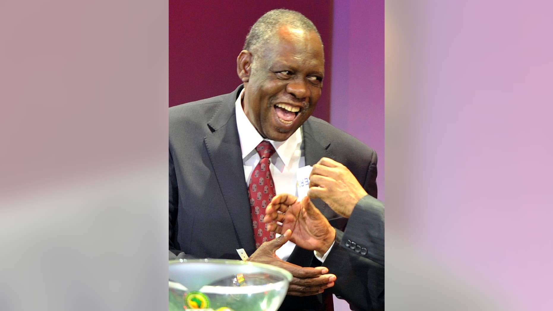 FILE - In this Wednesday Oct. 24, 2012, file photo Confederation of African Football (CAF) president Issa Hayatou attends the final draw of the Orange Africa Cup Of Nations in Durban South Africa. FIFA said Thursday, Oct. 8, 2015 that African soccer leader Isaa Hayatou will serve as acting president. (AP Photo)