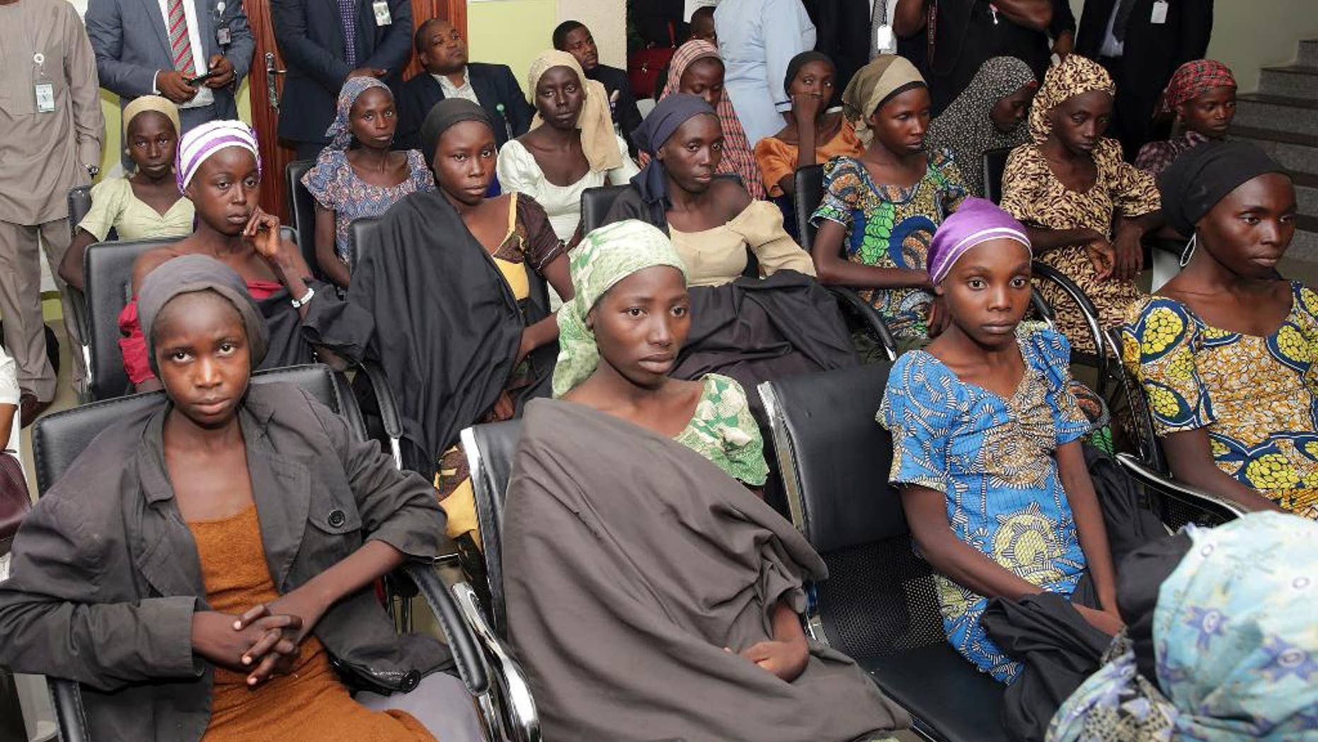 FILE - In this Thursday, Oct. 13, 2016 file photo released by the Nigeria State House, Chibok school girls recently freed from Islamic extremist captivity are seen during a meeting with Nigeria's Vice President Yemi Osinbajo, in Abuja, Nigeria. Nigeria's government must speedily negotiate the release of 195 kidnapped Chibok schoolgirls held by Boko Haram Islamic extremists for nearly three years, the Bring Back Our Girls group said Tuesday April 4, 2017. (Sunday Aghaeze/Nigeria State House via AP, File)