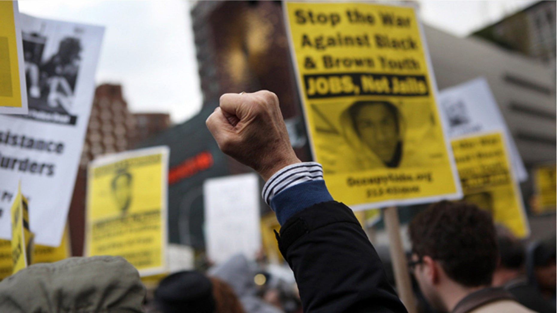 Protesters gather in support of Trayvon Martin at a demonstration on April 10, 2012 in New York City.