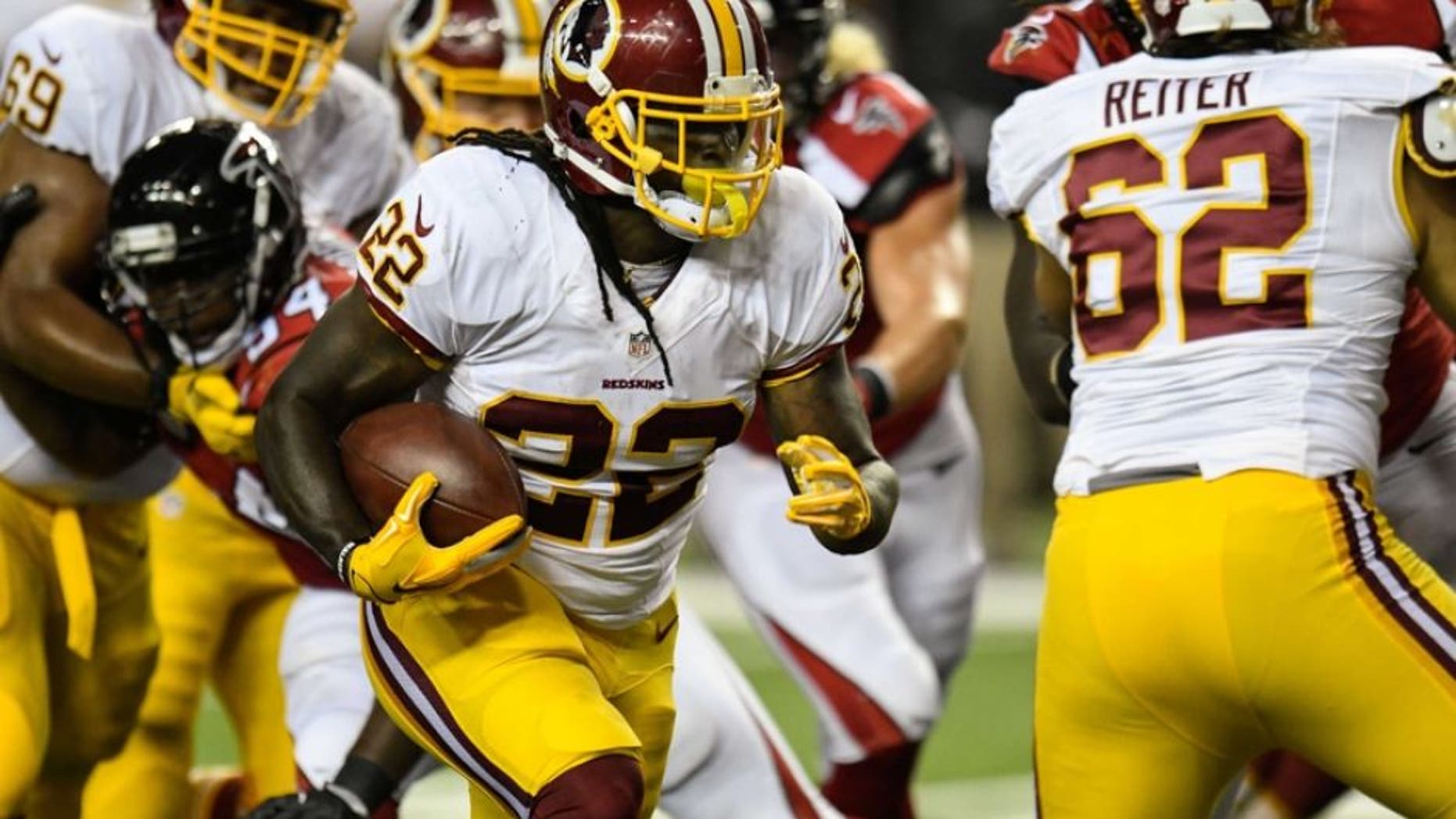 Aug 11, 2016; Atlanta, GA, USA; Washington Redskins running back Robert Kelley (22) runs the ball against the Atlanta Falcons at the Georgia Dome. The Falcons defeated the Redskins 23-17. Mandatory Credit: Dale Zanine-USA TODAY Sports