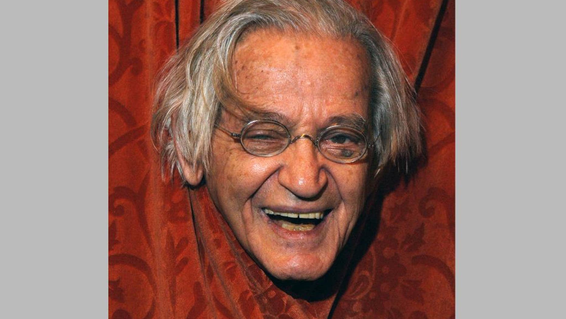 FILE - This April 24, 2004 file photo shows comedian Irwin Corey at the Ethel Barrymore Theatre in New York. Corey, the wild-haired comedian and actor who was known for his nonsensical style and who billed himself as “The World’s Foremost Authority,” died Monday, Feb. 6, 2017, at his home in Manhattan. He was 102. (AP Photo/Jim Cooper, File)