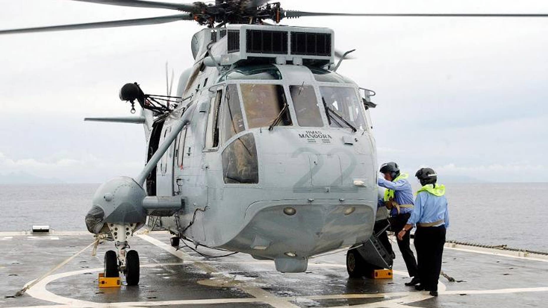Illustration: a navy helicopter was scrambled to save two French sailors after their vessel sank 360 miles off the coast of Australia