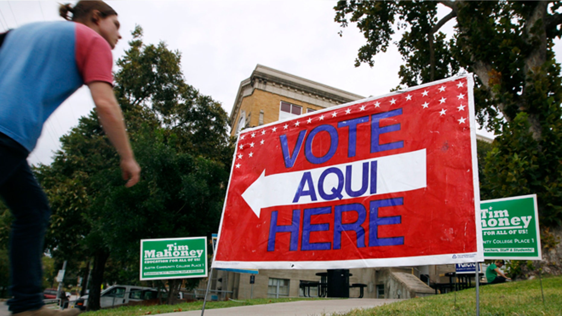 AUSTIN, TX - NOVEMBER 4: A sign shows the way to the polling station at Austin Community College on November 4, 2014 in Austin, Texas. Voters headed to the polls today to decide a number of tight races. (Photo by Erich Schlegel/Getty Images)
