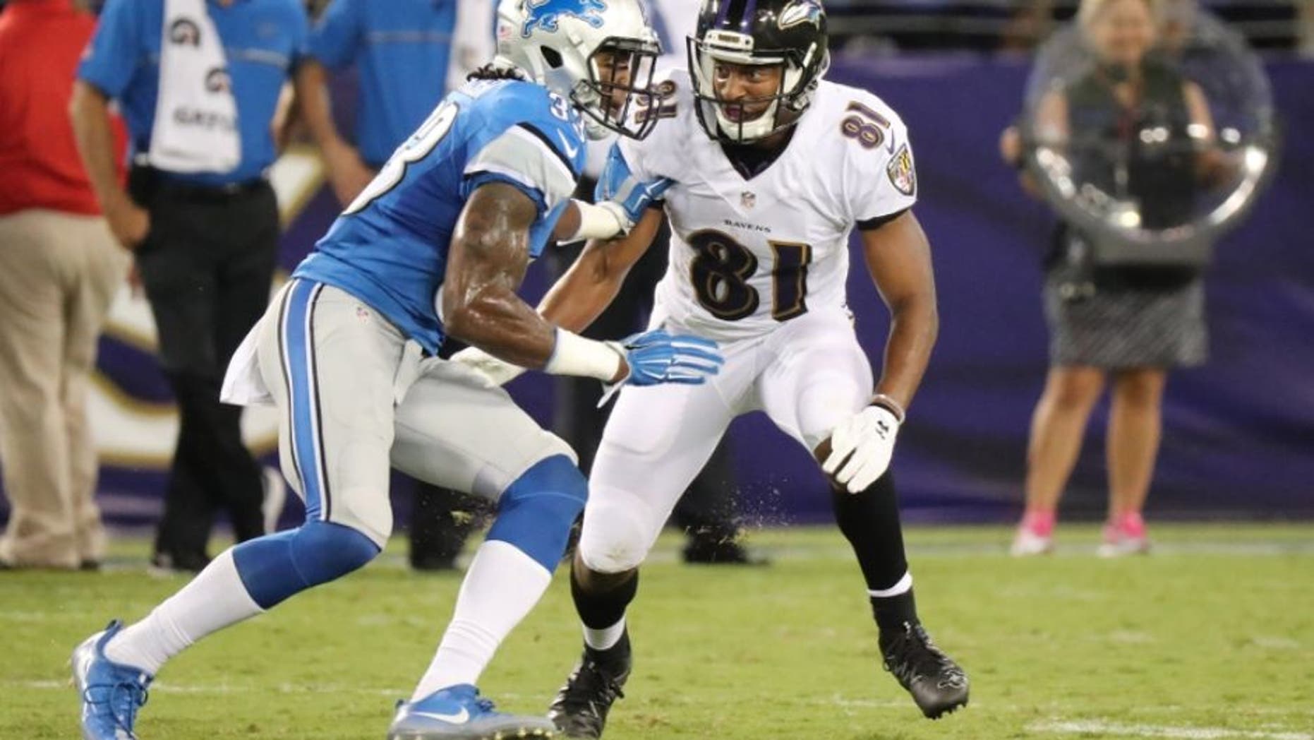 Aug 27, 2016; Baltimore, MD, USA; Baltimore Ravens wide receiver Keenan Reynolds (81) blocks Detroit Lions cornerback Alex Carter (33) at M&T Bank Stadium. Mandatory Credit: Mitch Stringer-USA TODAY Sports