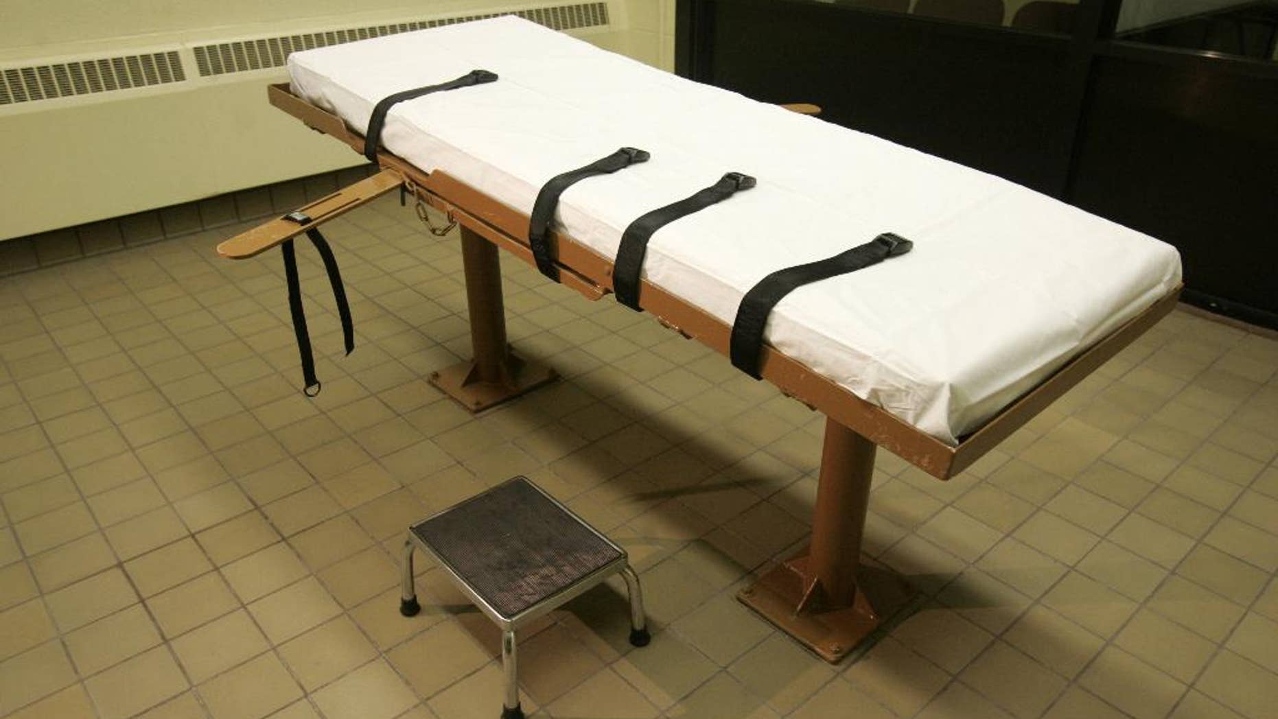 FILE - This November 2005, file photo, shows the death chamber at the Southern Ohio Correctional Facility in Lucasville, Ohio. The Ohio Supreme Court is weighing arguments by death row inmate Romell Broom that allowing the state prisons agency to try again to execute him amounts to cruel and unusual punishment and double jeopardy. The court planned to hear arguments Tuesday, June 9, 2015. (AP Photo/Kiichiro Sato, File)