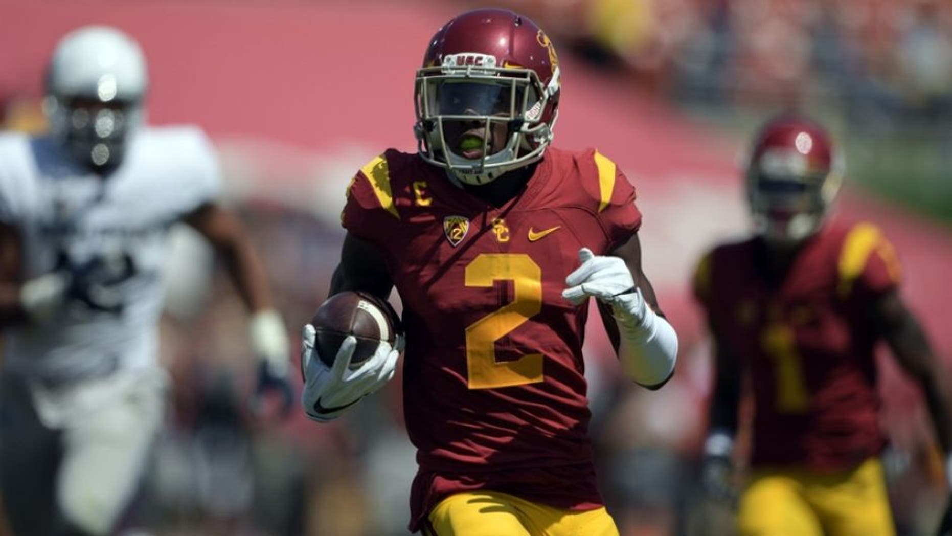 Sep 10, 2016; Los Angeles, CA, USA; USC Trojans defensive back Adoree Jackson (2) scores on a 79-yard punt return in the third quarter against the Utah State Aggies during a NCAA football game at Los Angeles Memorial Coliseum. Mandatory Credit: Kirby Lee-USA TODAY Sports