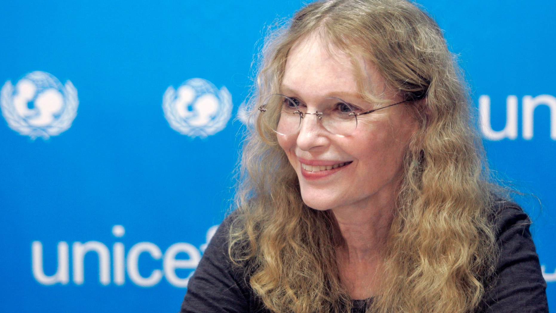 U.S. actress Mia Farrow, a UNICEF goodwill ambassador, holds a news conference in Gaza city October 15, 2009.