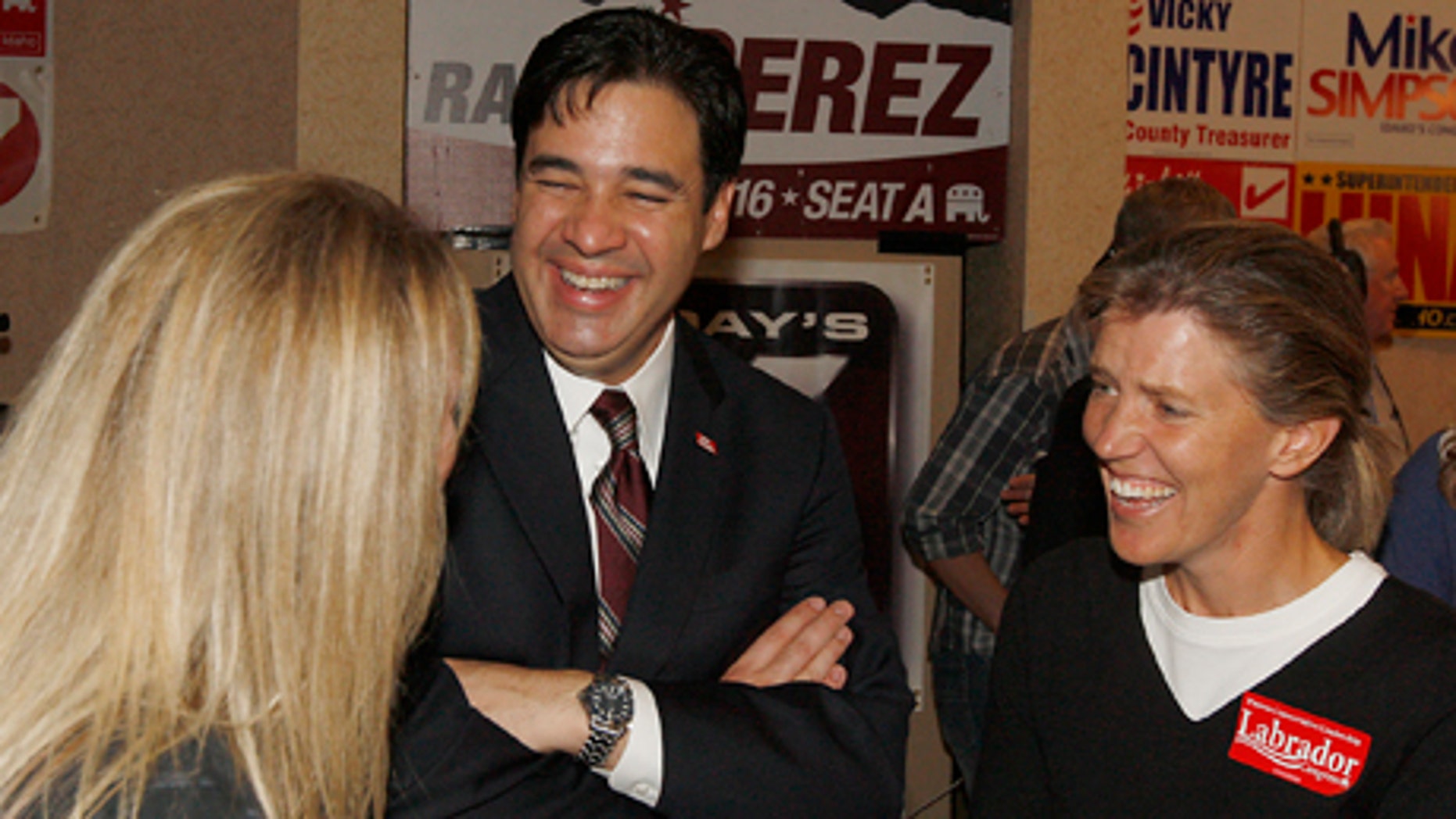 Raul Labrador talks with supporters Martha Johnson, right, and Kathy Johnson, left, at the Republican Party Election Headquarters at a hotel in Boise, Idaho on Tuesday, Nov. 2, 2010. Labrador is facing off against Democratic incumbant Walt Minnick for Idaho's 1st Congressional District. (AP Photo/Matt Cilley)