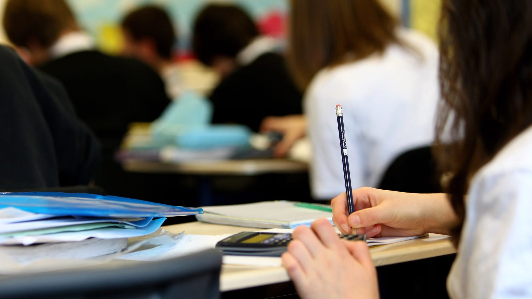 GLASGOW, UNITED KINGDOM - FEBRUARY 05: Pupils at Williamwood High School attend a math class on February 5, 2010 in Glasgow, Scotland. As the UK gears up for one of the most hotly contested general elections in recent history it is expected that that the economy, immigration, the NHS and education are likely to form the basis of many of the debates. (Photo by Jeff J Mitchell/Getty Images)