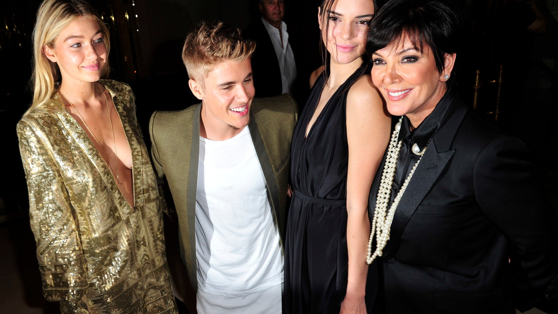 Gigi Hadid, Justin Bieber, Kendall Jenner, and Kris Jenner in Paris, Tuesday, Sept. 30, 2014.