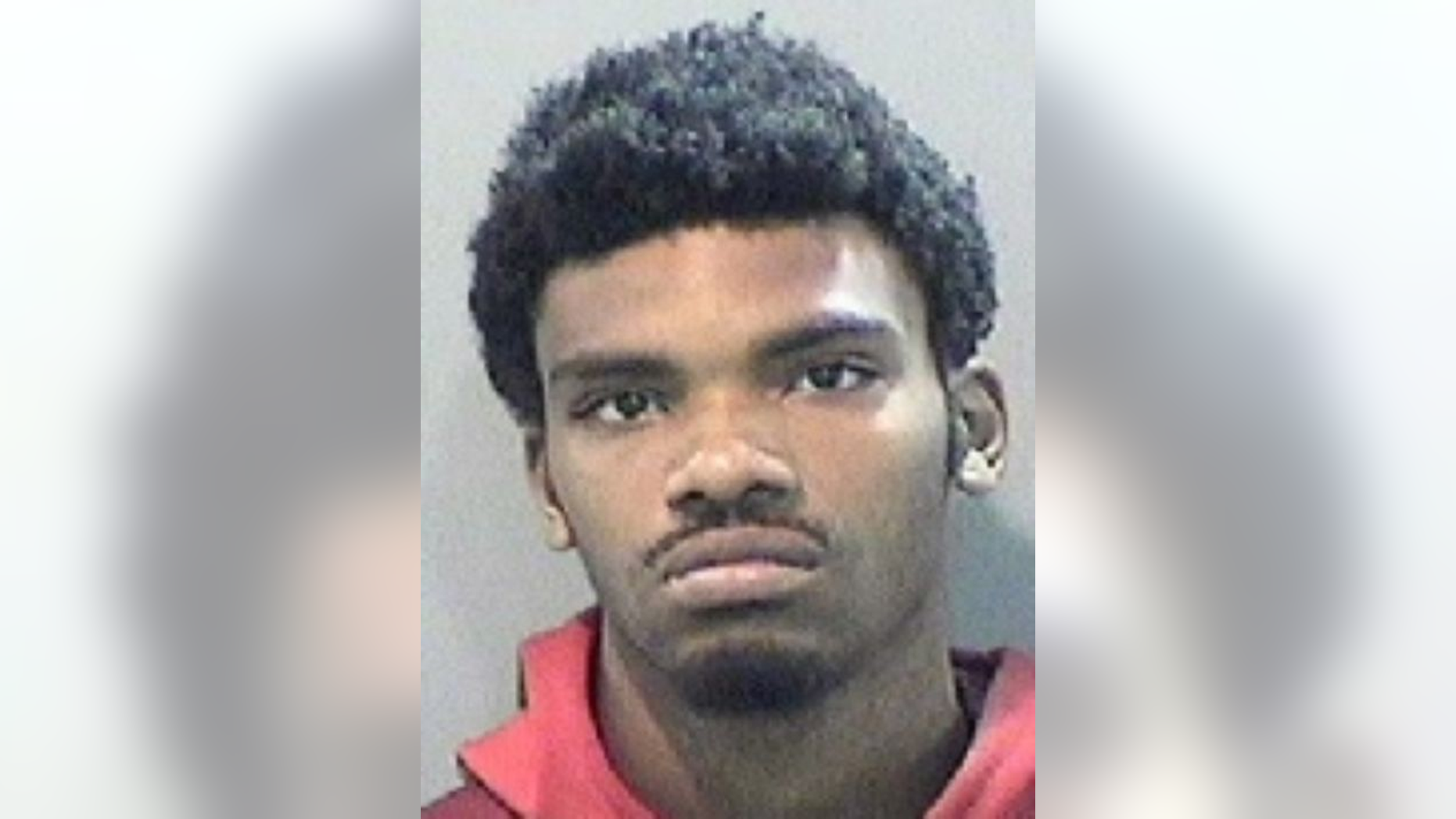 Keevon Robinson, charged with armed robbery and conspiracy to commit armed robbery.