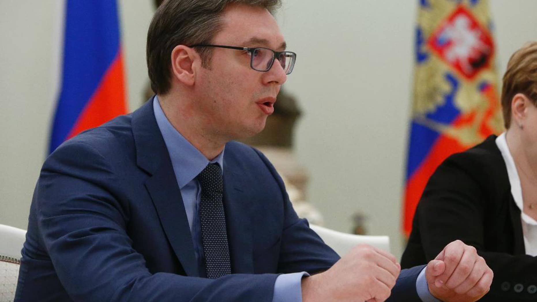 Serbian Prime Minister, Aleksandar Vucic, meets with Russian President Vladimir Putin during a meeting in Moscow, Russia, Monday, March 27, 2017. (Sergei Karpukhin/Pool photo via AP)
