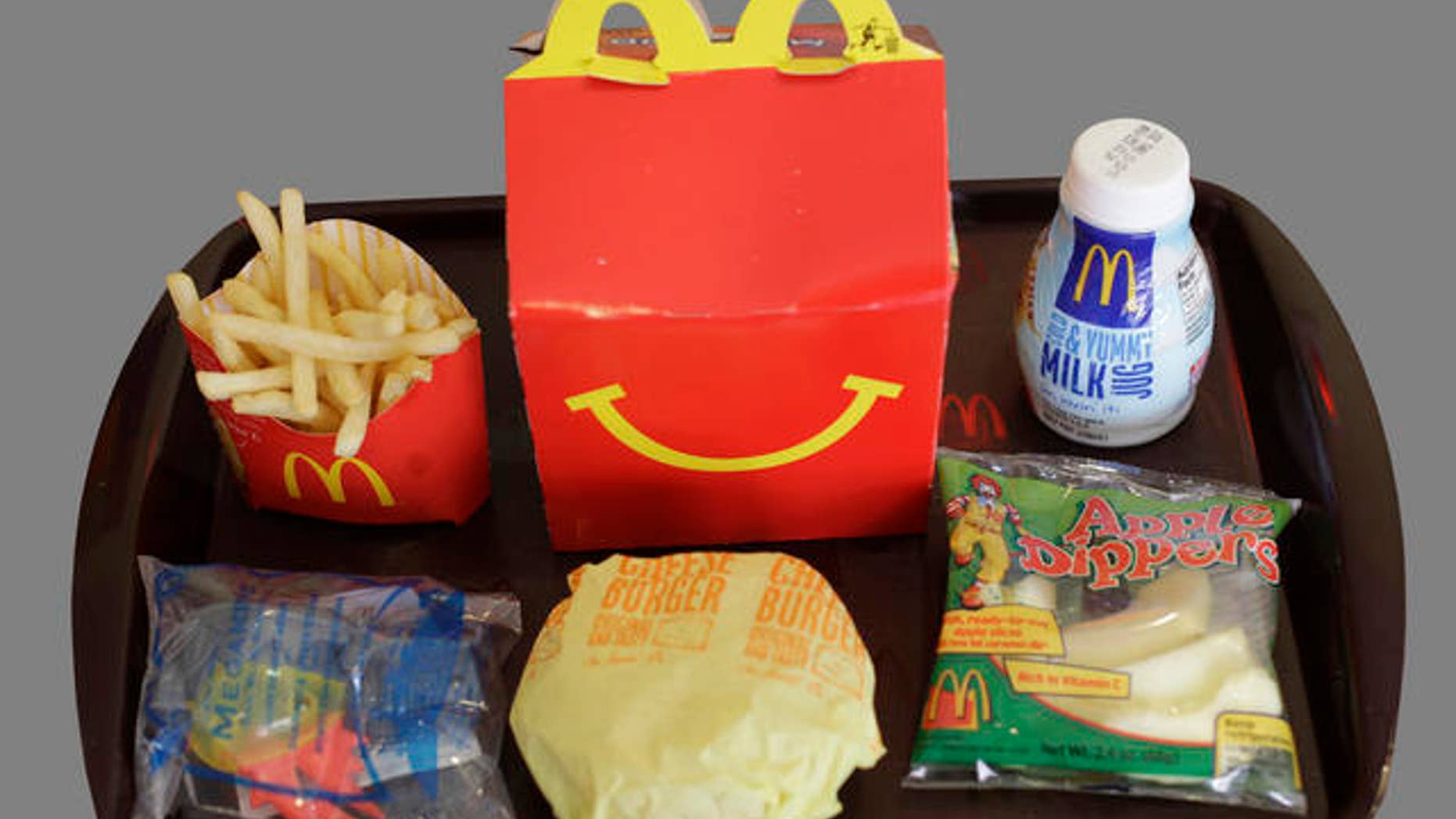 Shown is a Happy Meal at a McDonald's restaurant in San Francisco, Monday, Nov. 8, 2010. In the left foreground is a character toy included with the meal from the movie Megamind. It is a happy moment for people who see the Happy Meal as anything but. San Francisco is poised to become the first major American city to require fast-food restaurants to sell meals that meet set nutritional guidelines or not include a toy with them. (AP Photo/Eric Risberg)