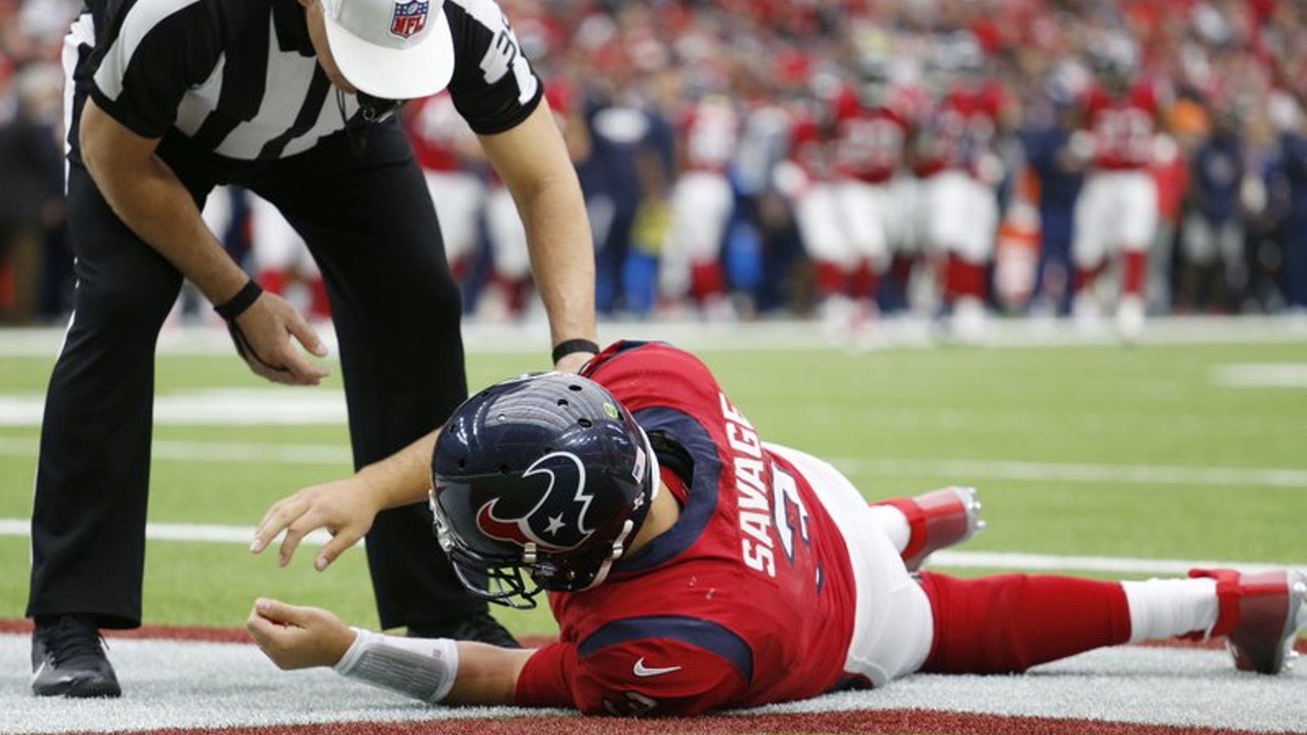 December 10, 2017: Houston Texas quarterback Tom Savage on the ground frollowing a hit during the second quarter of an NFL football game against the San Francisco 49ers.