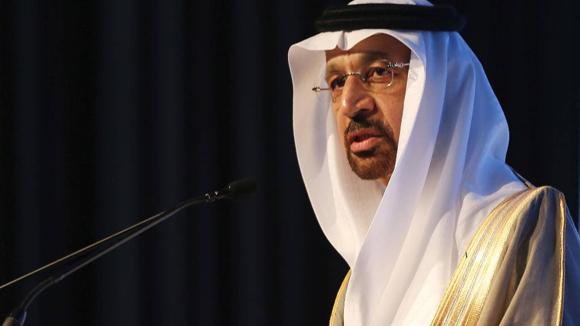 FILE- In this Jan. 12, 2017 file photo, Saudi's Oil Minister Khalid al-Falih, speaks during an Energy Forum in Abu Dhabi, United Arab Emirates. On Thursday, April 20, 2017, Al-Falih suggested that production cuts agreed to by OPEC members and countries outside of the cartel may need to continue to help shore up crude oil prices. (AP Photo/Kamran Jebreili, File)