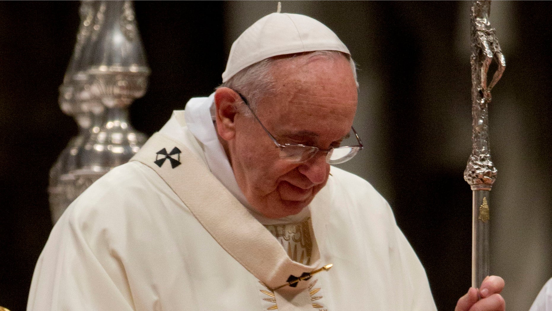 Pope Francis holds the pastoral staff as he celebrates a Mass for priests and nuns on the occasion of the feast of the presentation of the Lord, in St. Peter's Basilica at the Vatican, Monday, Feb. 2, 2015. (AP Photo/Andrew Medichini)