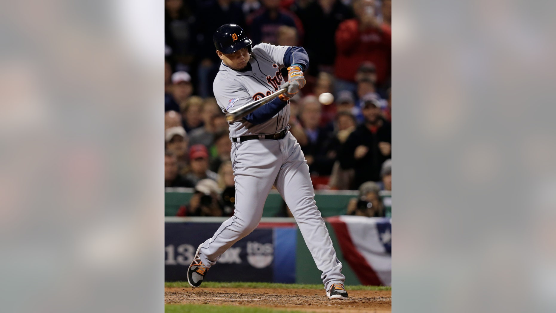 File-This Oct. 19, 2013 file photo shows Detroit Tigers' Miguel Cabrera hitting a single off Boston Red Sox starting pitcher Clay Buchholz in the sixth inning during Game 6 of the American League baseball championship series in Boston. Cabrera has won his second straight player of the year award in voting by his fellow major leaguers. Cabrera followed his Triple Crown season of 2012 with another impressive year. He led the American League with a .348 average and had 44 homers and 137 RBIs, both second to Baltimore's Chris Davis. Cabrera edged Davis and the Angels' Mike Trout for the honor. (AP Photo/Charles Krupa, File)