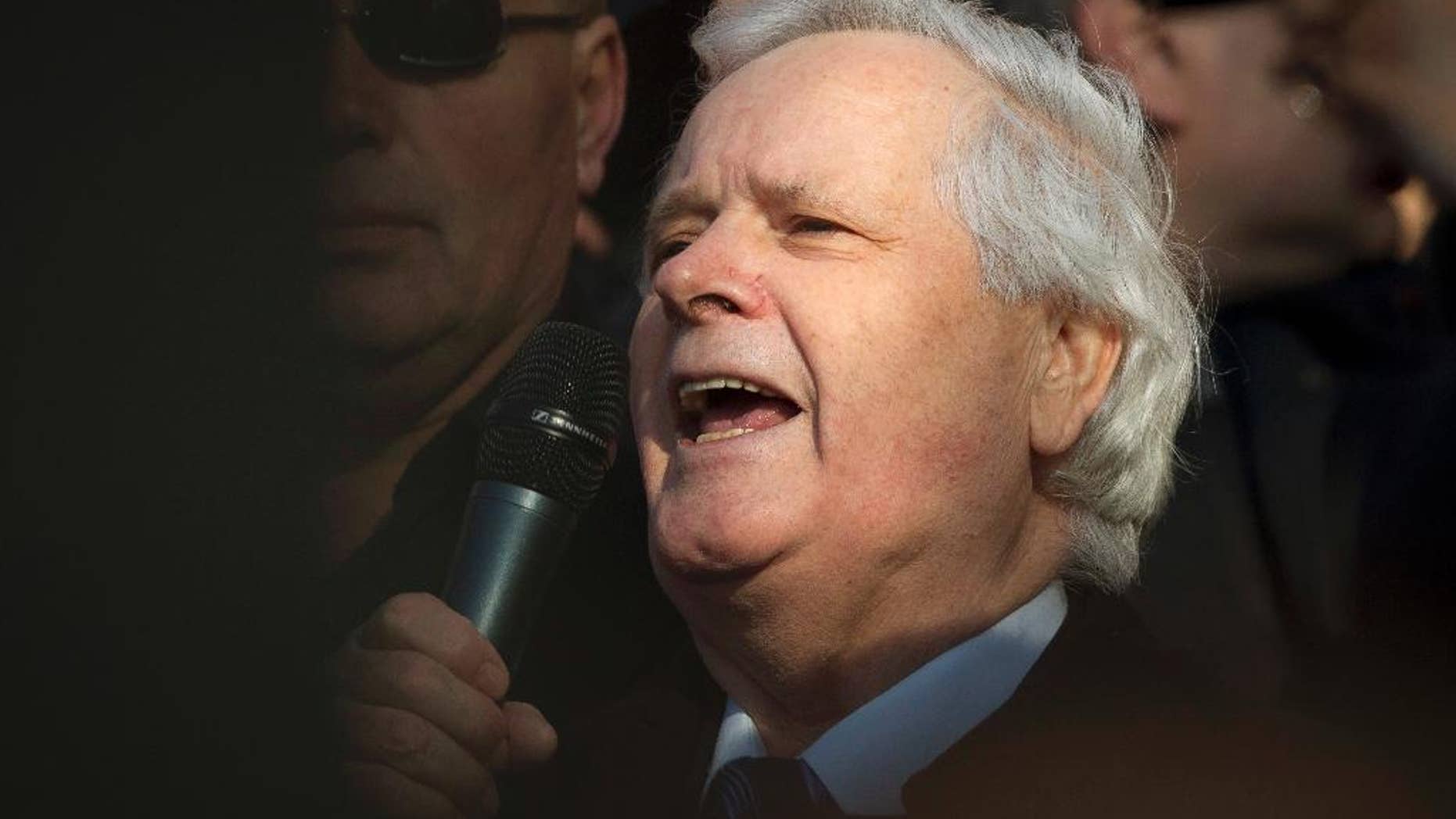 FILE - In this March 9, 2012 file photo, Fikret Abdic speaks to his supporters upon his release from prison in Pula, Croatia. Abdic, a convicted war criminal, was sworn in as mayor of the western Bosnian town of Velika Kladusa on Tuesday, Nov. 8, 2016. (AP Photo/Darko Bandic, File)