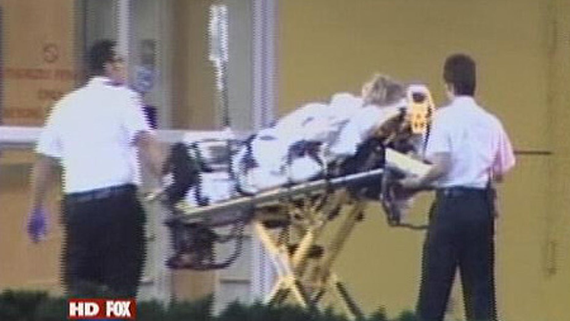 Dec. 8: A woman is seen being pushed on a gurney into Health Central Hospital in Ocoee, Fla.