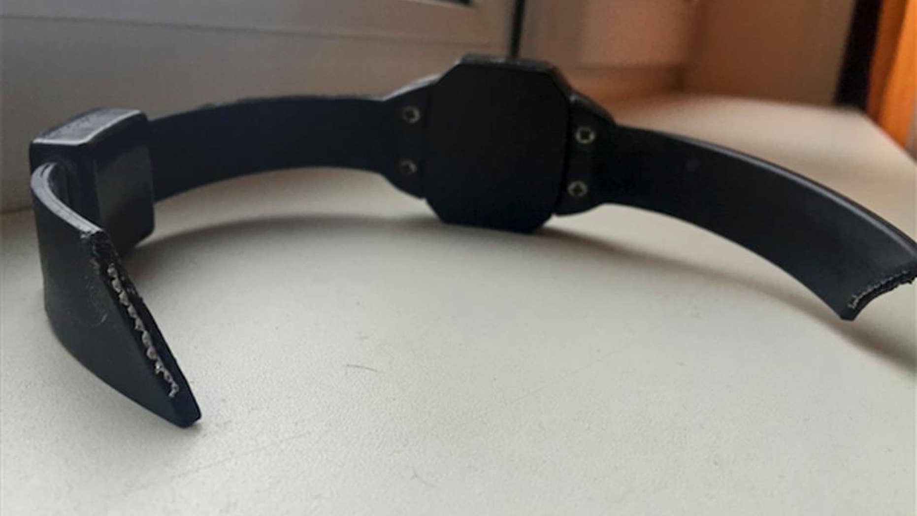 In this handout photo taken on Monday, Jan. 5, 2015, the electronic tagging bracelet is displayed at Russian anti-corruption crusader Alexei Navalny's home in Moscow after he cut it off. Navalny, the leading foe of President Vladimir Putin, says he has cut off the electronic bracelet that was monitoring his house arrest. (AP Photo/Alexei Navalny)