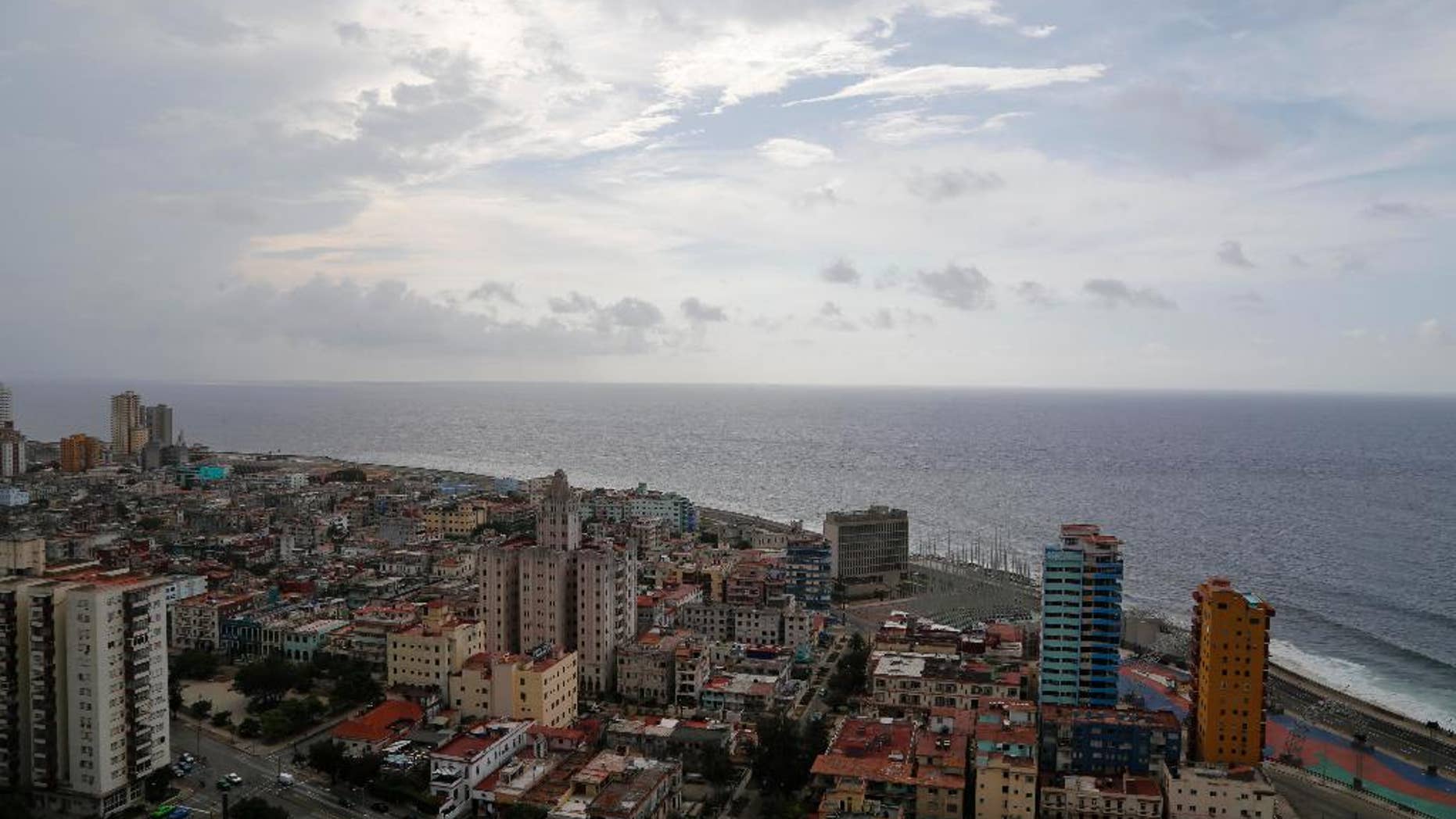 This coastal view of Havana, Cuba shows the United States Interests Section diplomatic mission, the third tall building from the right, on Sunday, May 24, 2015. On Friday, May 29 the Obama administration formally removed Cuba from a U.S. terrorism blacklist as part of the process of normalizing relations between the Cold War foes. (AP Photo/Desmond Boylan)