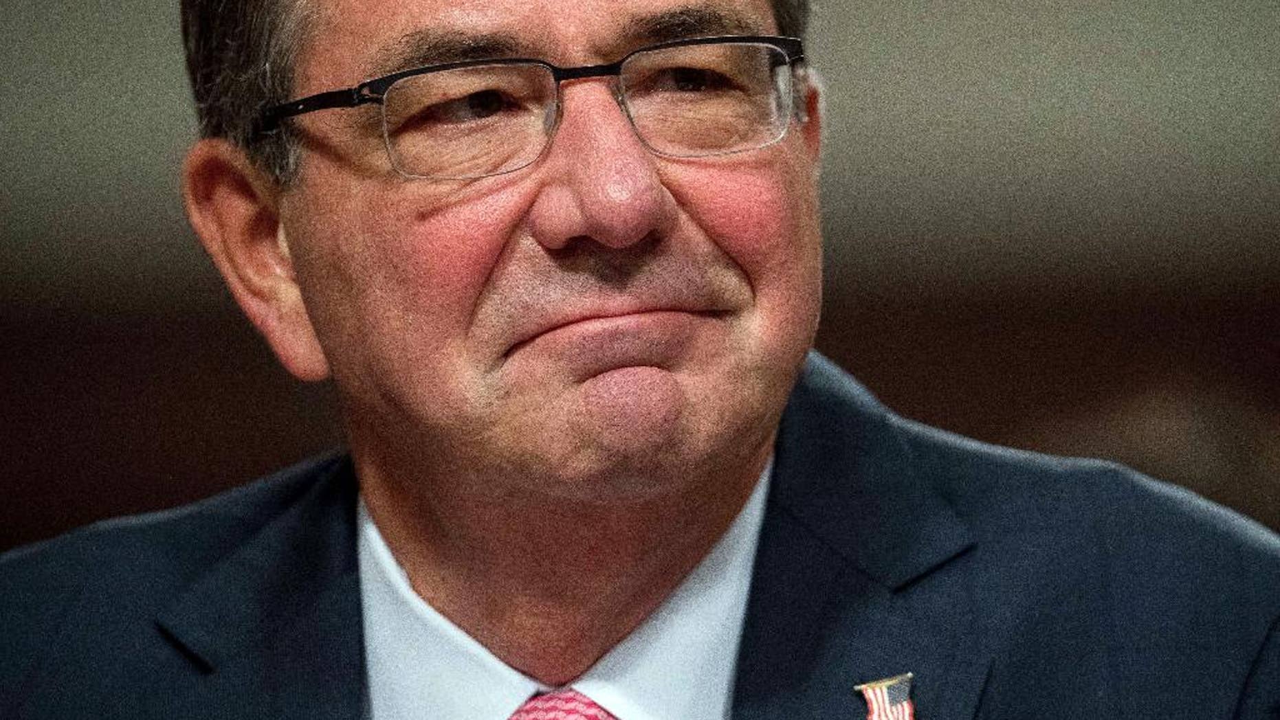 FILE - In this Sept. 22, 2016, file photo, Defense Secretary Ash Carter testifies on Capitol Hill in Washington. The Obama administration is announcing its support for requiring women to register for the military draft. The administration has been deliberating for roughly a year about whether to back such a change to the Selective Service. (AP Photo/Andrew Harnik)