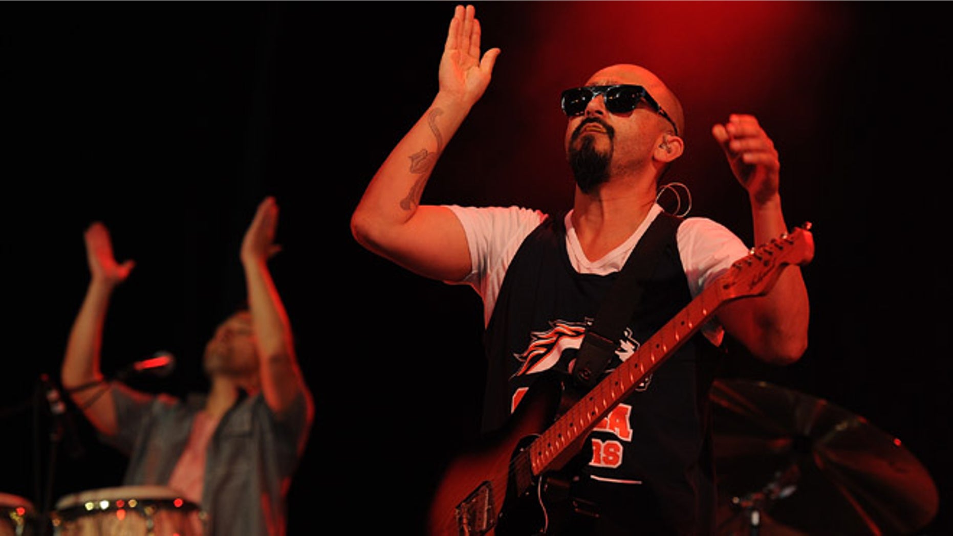 BYRON BAY, AUSTRALIA - APRIL 21: Raul Pacheco of Ozomatli performs live for fans at the 2014 Byron Bay Bluesfest on April 21, 2014 in Byron Bay, Australia. (Photo by Matt Roberts/Getty Images)