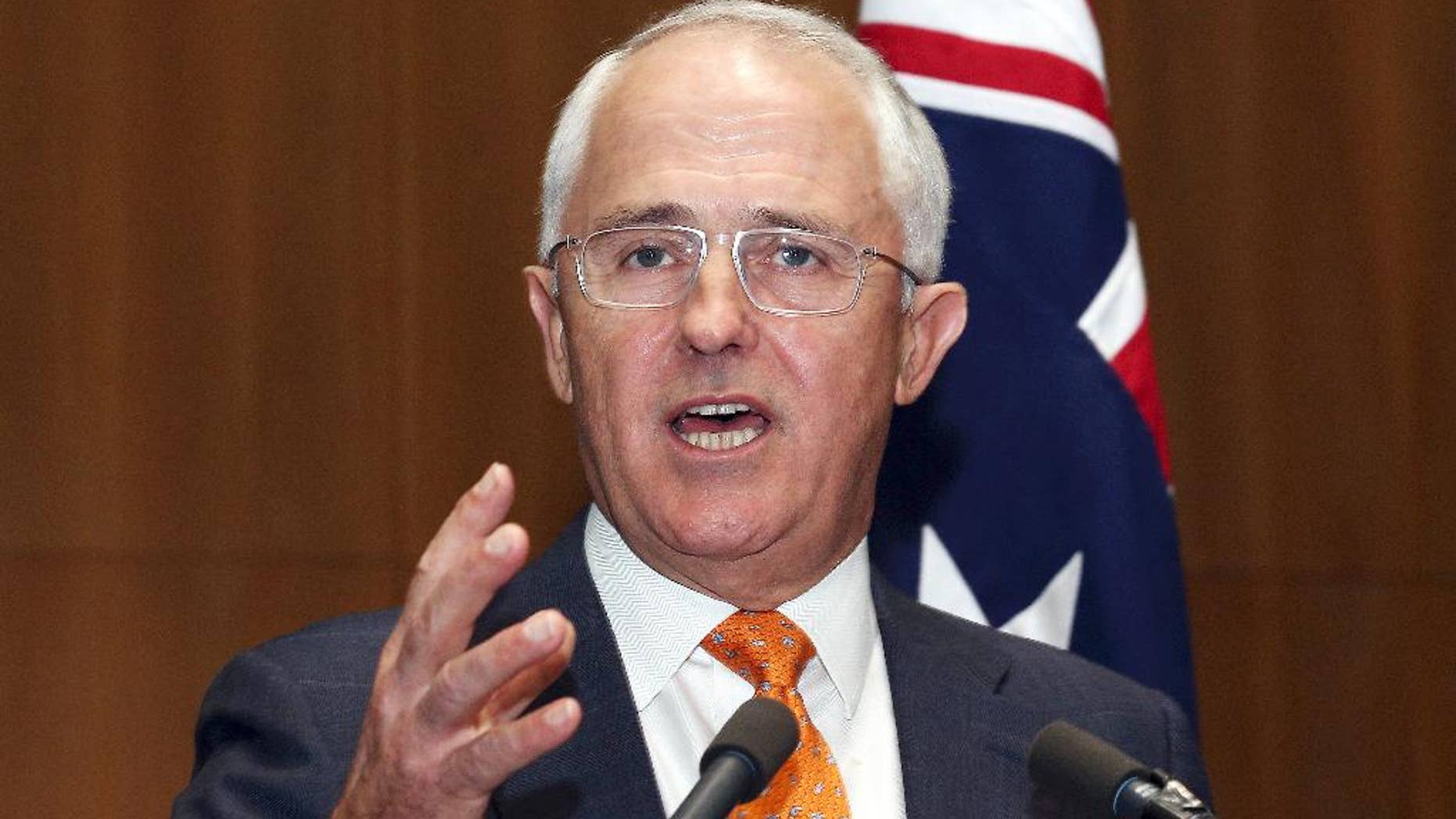 FILE - In this May 8, 2016 file photo, Australian Prime Minister Malcolm Turnbull speaks to the media during a press conference at Parliament House in Canberra. Turnbull said Friday, June 17, 2016 he would not have invited a senior imam to a multi-faith dinner if he had been aware of the Muslim cleric's anti-gay preaching. Malcolm Turnbull on Thursday became the first Australian prime minister to host an iftar - the meal at which Muslims end their daily Ramadan fast at sunset. (AP Photo/Rob Griffith, File)