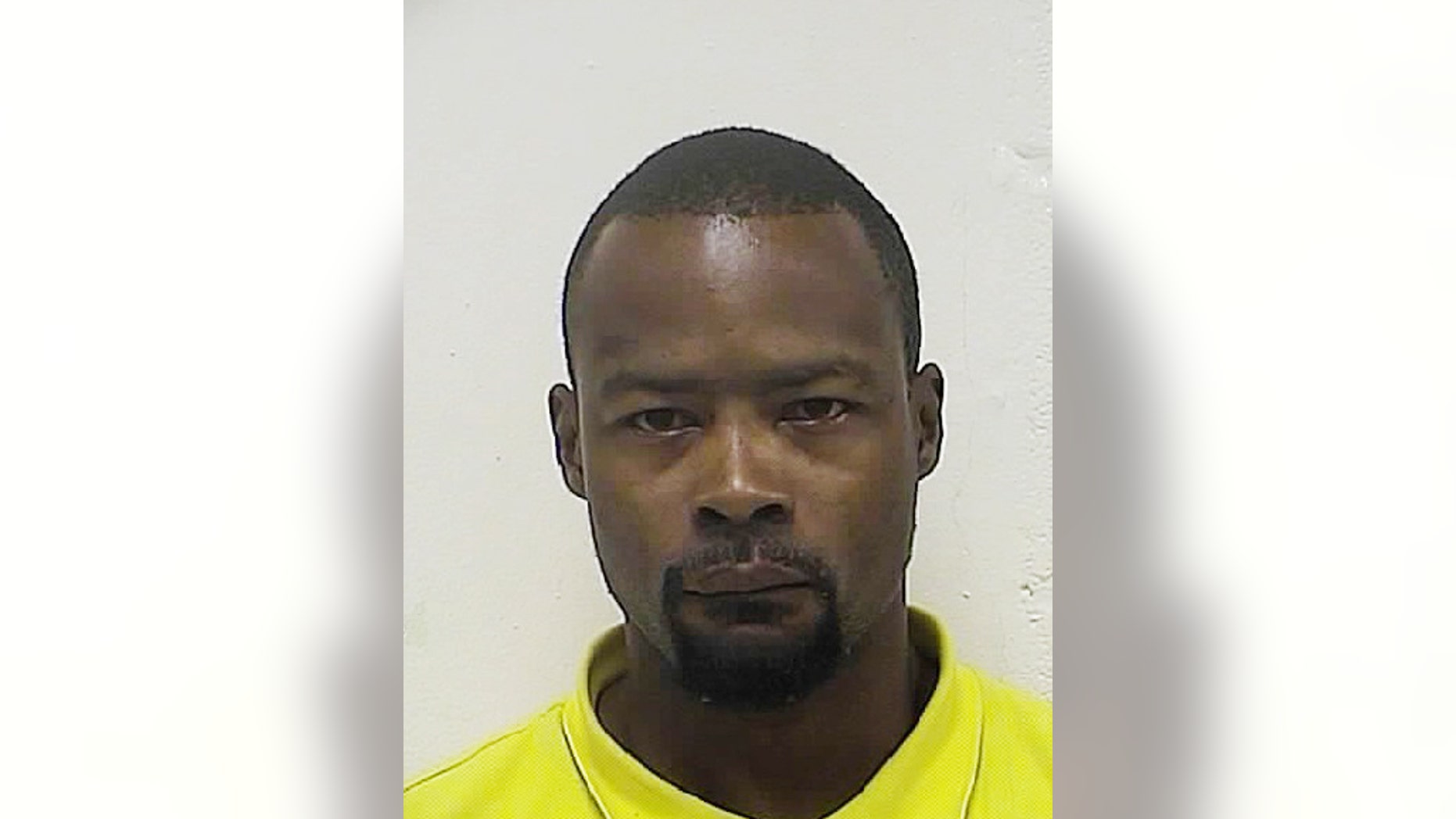 Darrell Brown is shown in a police booking photo taken July 27, 2013, by the Washington County, Maryland, Sheriff’s Office. Brown died April 16, 2015, after Hagerstown, Md., police shocked him with a Taser. Five Hagerstown police officers involved in the stun-gun-related death of Brown, a home invasion suspect won't be criminally charged, authorities said Thursday, Aug. 6, citing an autopsy report's finding that the man died from drug-induced "excited delirium in the setting of police restraint."(Washington County Sheriff’s Office via AP).
