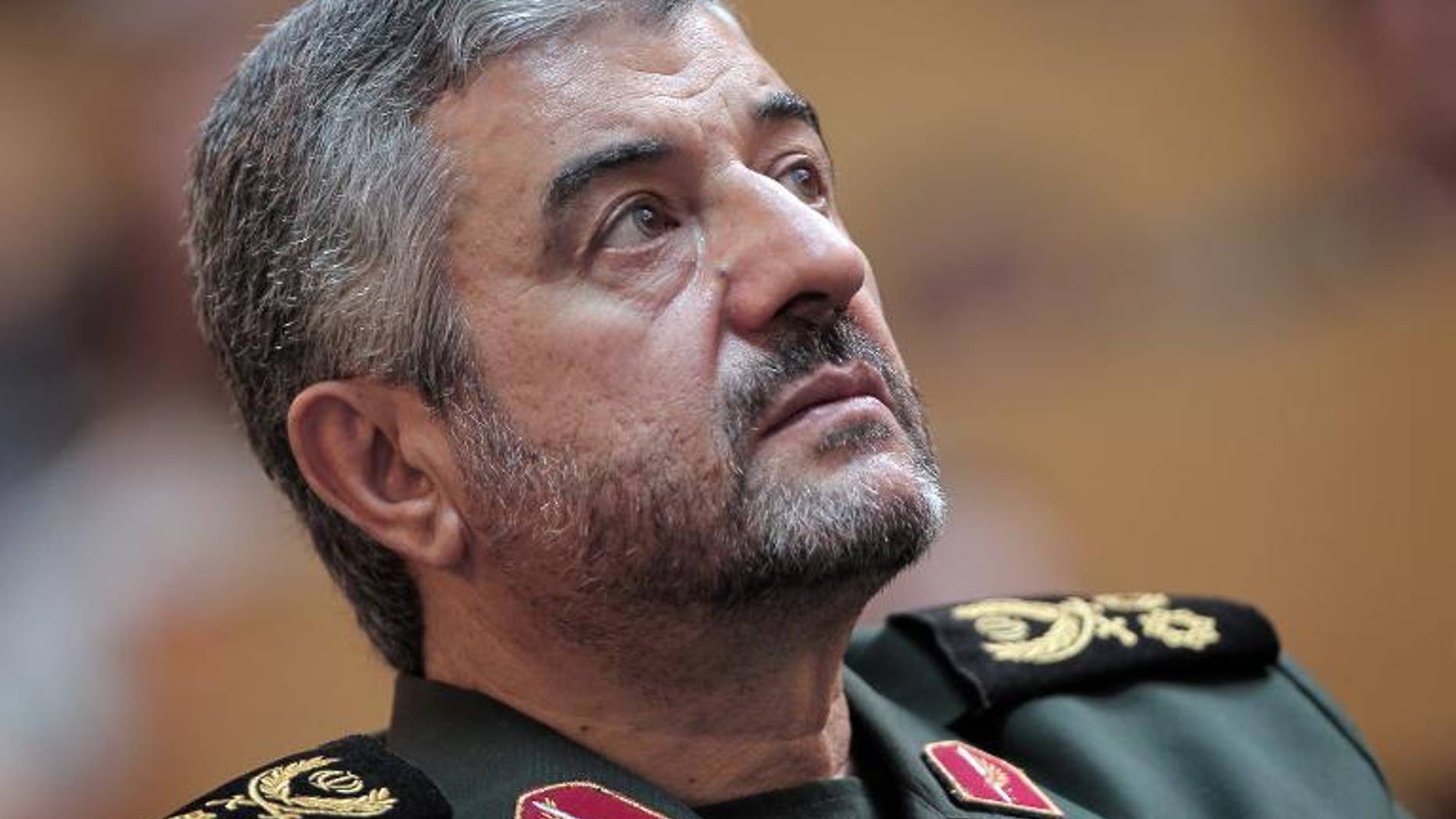 Iran's Revolutionary Guards commander General Mohammad Ali Jafari looks up during a ceremony in Tehran, on September 6, 2011