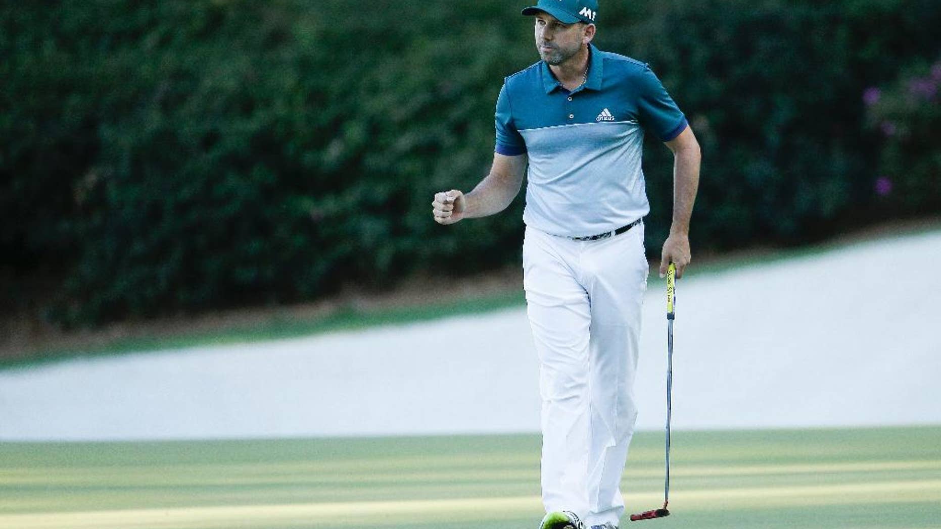 Sergio Garcia, of Spain, reacts after saving par on the 13th hole during the final round of the Masters golf tournament, Sunday, April 9, 2017, in Augusta, Ga. (AP Photo/Charlie Riedel)