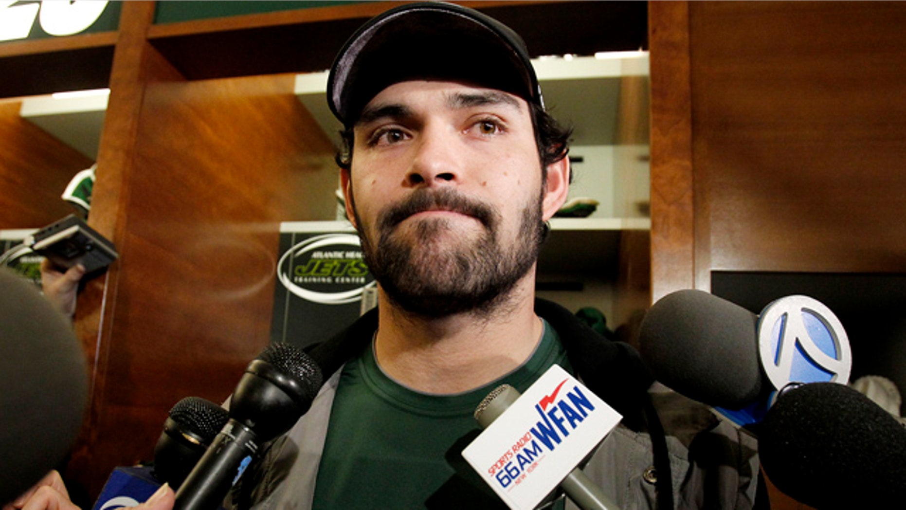 Jan. 24: New York Jets quarterback Mark Sanchez talks to reporters before cleaning out his locker in Florham Park, N.J.
