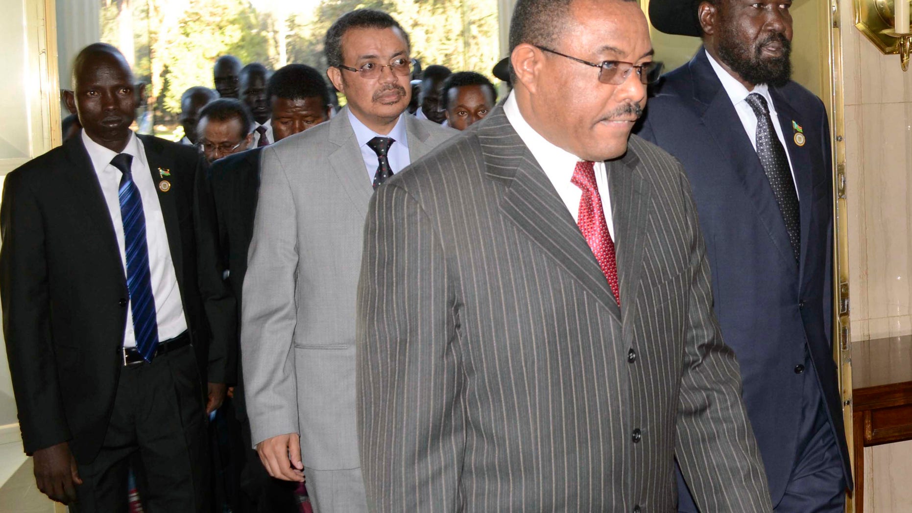 President Salva Kiir, right, of South Sudan arrives at the National Palace with Prime Minister Hailemariam Dessalegn, left, of Ethiopia during talks in Addis Ababa, Ethiopia, Friday Jan. 4, 2013.The presidents of Sudan and South Sudan are meeting to try to break through stalled oil agreements.(AP Photo)